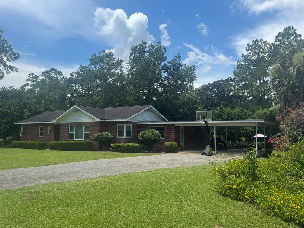 This spacious 3 bedroom & 2.5 bath home is a must see!  Plenty of room to host a dinner party or have a family celebration.  Two (2) car garage, pool, pool house, & the immaculate yard are just a few things that make this home so special.  Close to downtown yet a private oasis right in your backyard.  Close to everything!  Call your favorite Realtor today for a showing.