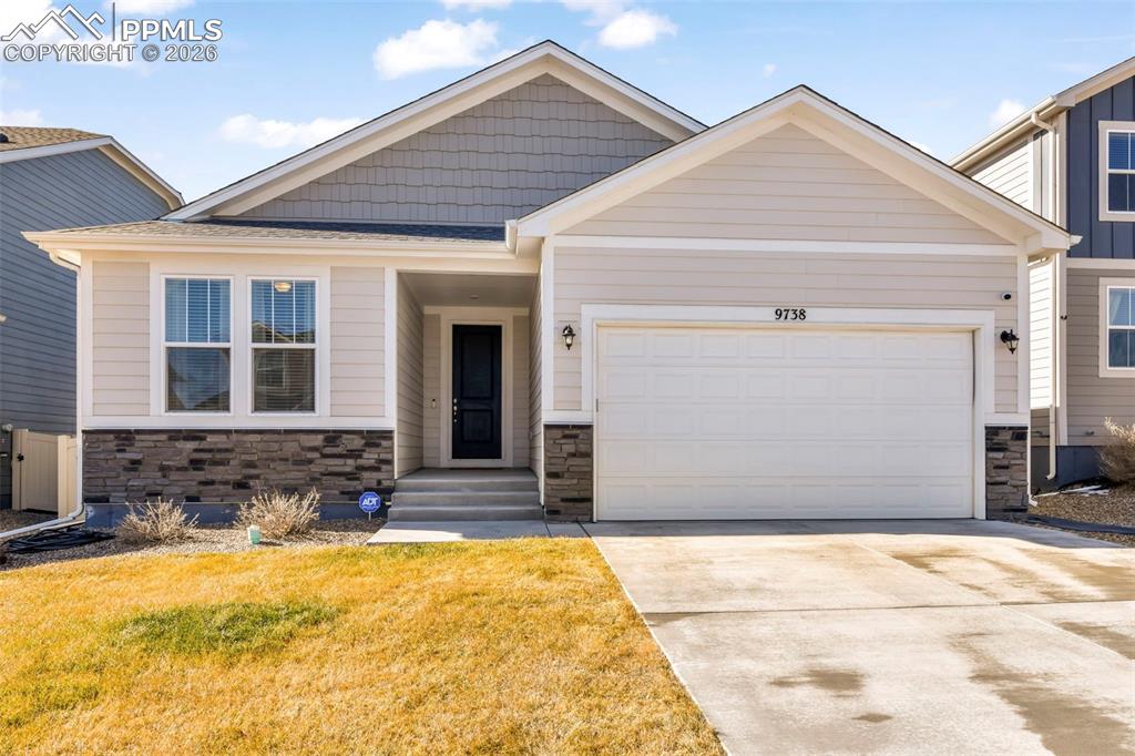 Welcome home to comfort, space, and breathtaking Colorado views. This beautifully maintained property offers an open and functional layout designed for everyday living. The heart of the home is a spacious kitchen featuring expansive granite countertops, a large center island, stainless steel appliances including a gas range, tons of cabinetry, and generous prep space. The kitchen flows seamlessly into the dining area and bright living room, where natural light pours in and mountain views create a stunning backdrop. Outside is an elevated deck and take in Front Range views and open skies. The backyard offers room to relax, play, or personalize to your vision.  The primary suite provides a peaceful retreat with ample space and natural light, while two additional main level bedrooms offer flexibility for family, guests, or a home office. The bathrooms showcase granite counters, modern fixtures, and clean finishes throughout.  Downstairs, the expansive finished basement creates incredible bonus space for a media room, recreation area, home gym, or multigenerational living. Two other additional bedrooms and plush carpeting and recessed lighting make the space comfortable and inviting.  Located in a growing community with convenient access to schools, parks, and daily amenities, this home delivers the space you need with the views you want. Colorado living at its best.