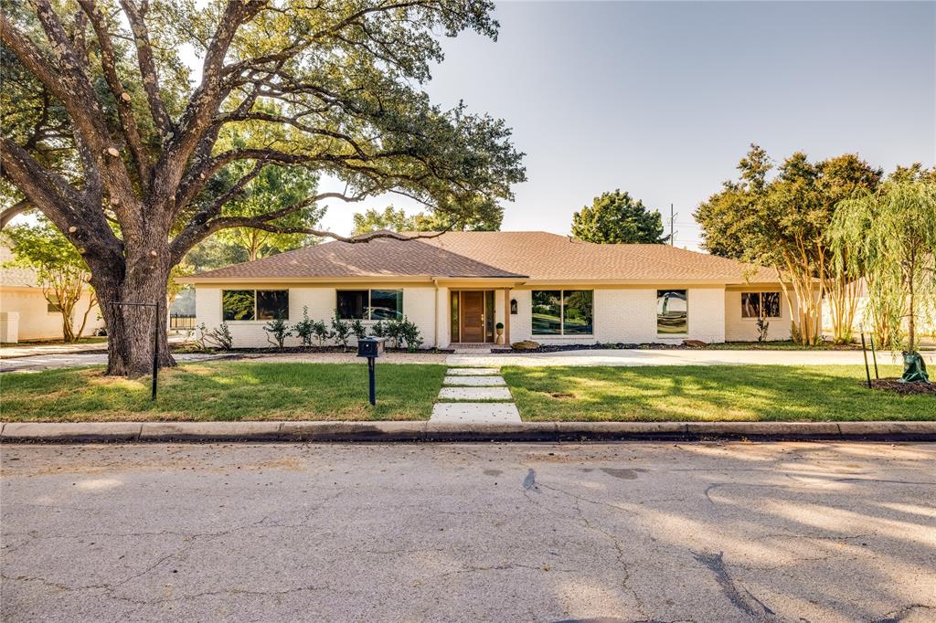 Fully renovated 4BR, 3BA, 2,777 sq ft home located on the 4th fairway of Ridglea Country Club’s Championship Course. White oak floors throughout, new mahogany front door, new windows with lifetime warranty, new driveway, sprinkler system and sod. Stunning kitchen with all new cabinets, quartz counters, antique bronze finishes, seating island and stainless appliances. Spa-like primary suite with floating oak vanity, quartz counters, soaking tub, walk-in shower, Mariposa Roman clay walls and hidden hardware oak door. Guest baths with new tile, quartz, fixtures and Kashmir limewash walls. Office features floating oak doors and café-style opening to kitchen. Laundry with checkered tile and custom cabinetry. Every closet refinished, all new copper wiring and electrical panel, foundation repaired. Golf course views, exclusive location and elevated lifestyle await.