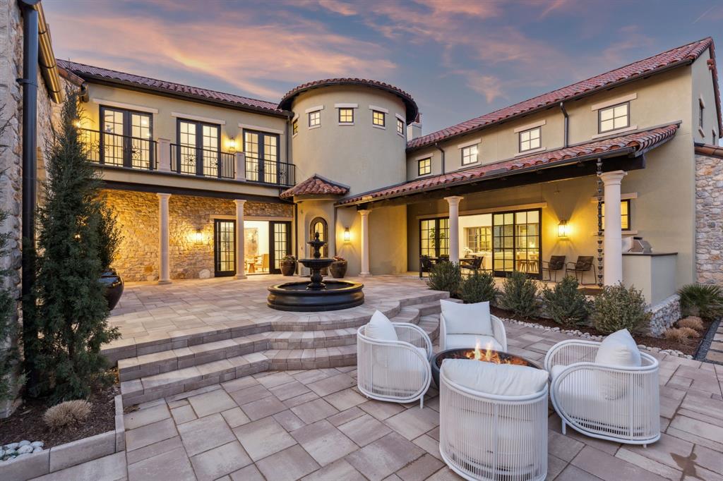 This stunning residence by Crescent Estates showcases a sophisticated design, highlighted by a must-see great room with high vaulted ceilings, wood beams, an elegant spiral staircase, walls of windows, and a connecting veranda that opens to a spacious inner courtyard. This serene outdoor retreat is ideal for gatherings. The home features four spacious bedrooms, five luxurious baths, a dedicated study, and two large living areas. White oak floors, Subzero and Wolf appliances, premium countertops, and elegant lighting complete the home, epitomizing refined living in Westlake. Experience the exceptional lifestyle offered by Entrada's prime location with quick access to top-tier amenities, close proximity to Dallas, Fort Worth, DFW Airport, Westlake's new Lifetime Fitness, Grapevine Lake, and premier shopping at Southlake Town Square, convenience is truly at your doorstep. Entrada is part of Westlake's highly sought-after luxury corridor with Carroll ISD or Westlake Academy school options.