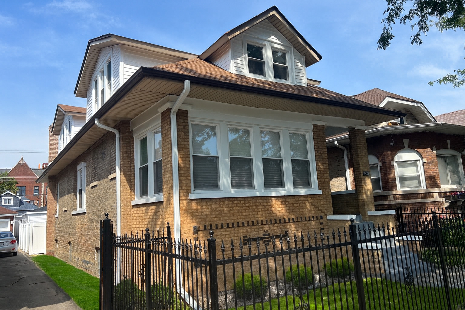 ***COMPLETE BRAND NEW ROOF INSTALLED!!***AMAZING CHICAGO BUNGALOW - FULL 2ND FLOOR!! - A High-End Luxury Masterpiece at 1428 N Central Ave, Chicago, IL 60651. Welcome to this stunning, fully-renovated brick bungalow where luxury, space, and craftsmanship meet. Situated on an extra-wide lot in one of Chicago's most vibrant neighborhoods, this home is a true showstopper-a property where no detail has been overlooked and no expense has been spared.    Boasting 6 incredibly spacious bedrooms and 3 full designer bathrooms, this residence offers ample space for families of all sizes. The open-concept layout is flooded with natural light and showcases brand-new, rich hardwood floors throughout, along with high ceilings that create an expansive and inviting atmosphere on every level.    Step into the full finished basement, which features super high ceilings and luxury porcelain tile flooring-a perfect retreat for entertainment, guest living, or a home office suite. The master bedroom is your personal sanctuary, complete with a massive walk-in closet that's designed to impress.    Enjoy peace of mind with all-new electrical and plumbing systems, a brand-new high-efficiency HVAC system, and elegantly updated exterior finishes that give this home unbeatable curb appeal. Outside, the property features a 2-car garage, an additional exterior parking space, and is nestled behind a sleek modern fence-adding both style and security.    Topped off with incredibly low property taxes, this is a rare opportunity to own a move-in-ready luxury home in an ideal location. Drive and call to schedule your private showing! This one-of-a-kind gem that won't last long!