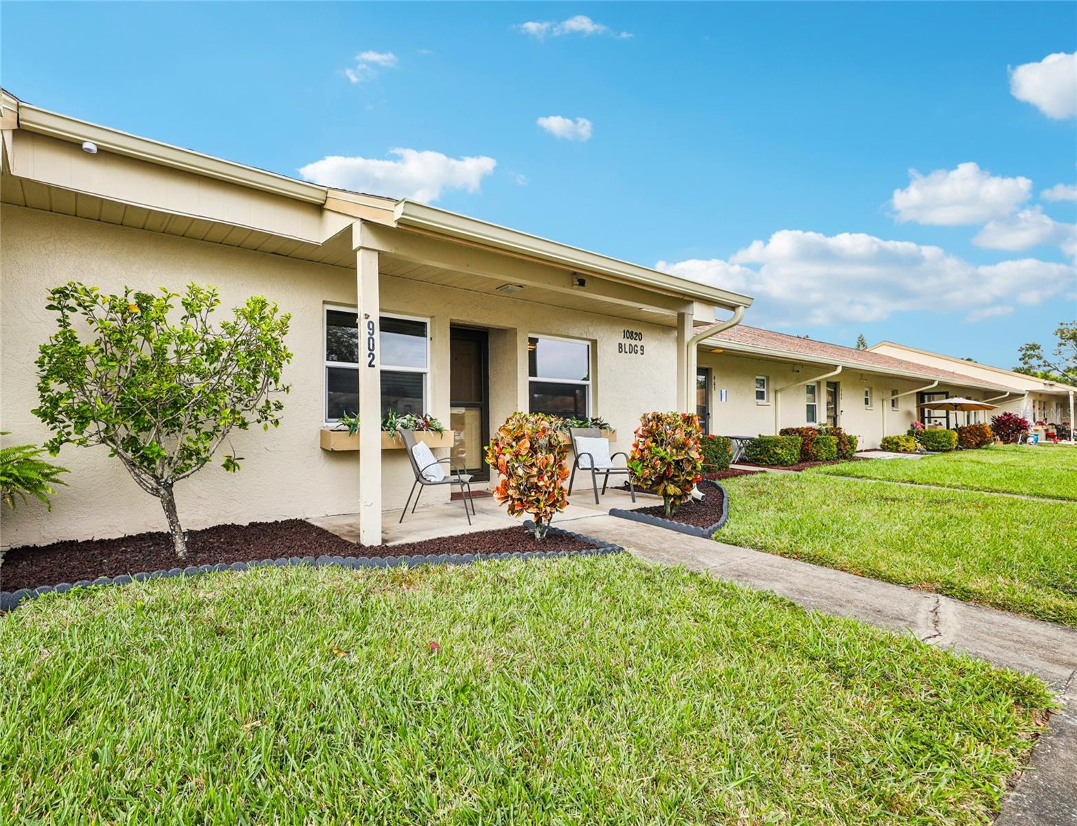 Location, Location, Location! Discover Summertree at The Lakes. This Modern high-end renovated and newly furnished villa is sure to impress. Only 46 steps away from the community heated pool. Some features include Brand New architectural 3-deminsional shingle roof and gutters, High Impact Hurricane windows, newer water heater, Gorgeous Kitchen with sparkling quartz counter tops, quartz backsplash and breakfast bar with new bar stools, custom soft close cabinetry and stylish hardware, cutting-edge sleek stainless-steel appliances with lighted dishwasher, glass top stove, hood vent, censored faucet, under cabinet water filtration system, pantry, and high-end light fixture. Open floor plan highlights the cathedral ceiling with knock down texture, modern blinds, 6 panel interior doors, updated baseboards, stylish trendy ceiling fans and light fixtures throughout. Upgraded wood look porcelain tile flooring throughout main living areas with new carpet in the bedrooms. Living room comes complete with new comfortable furniture, large flatscreen tv and surround sound system. Master suite is perfectly set up with full bedroom suite and features a walk-in closet and ensuite bathroom with walk-in stall shower, glass door, custom tile work, large vanity with quartz countertop and designer light fixture. The guest suite is also fully set up with walk-in closet. The guest bath has been nicely updated with new tub and custom tile work, contemporary style vanity, updated mirror and light fixture. Step outside through your hurricane rated sliding doors with built in blinds and check out your screened in patio with NO REAR NEIGHBORS, Laundry closet with full size washer and dryer, and outside paver patio. NOT IN A FLOOD ZONE and Underground utilities provide peace of mind. Lakes at Summertree Village is a pet-friendly community with no age restrictions. Come see all of the features this gorgeous villa and community have to offer; this move-in-ready unit won't last long! Summertree Village is across from the protected Roosevelt Wetlands, where over 100 species of birds and other wildlife can be spotted while enjoying the walking trails and lakes. Conveniently located just minutes from Mainland's Golf Course, Bill Jackson’s Shop for Adventure, Aldi, and Freedom Lake Park, which offers an amazing dog park with large, fenced exercise space separated for large and small dogs, hydrants, watering holes, and plenty of shade for your pets. Freedom Lake Park also features covered, outdoor fitness stations, fishing, grilling, picnic tables, pavilions, a new playground, walking track and the Korean War Memorial. Easy Access to Gulf Beaches, Sam’s Club, coffee shops, fitness centers, shopping, dining, Helen Howarth Park, an Equestrian Trail, and Forbes recreation area. Easy access to route 19 and I-275, St. Pete/Clearwater and Tampa International Airports.