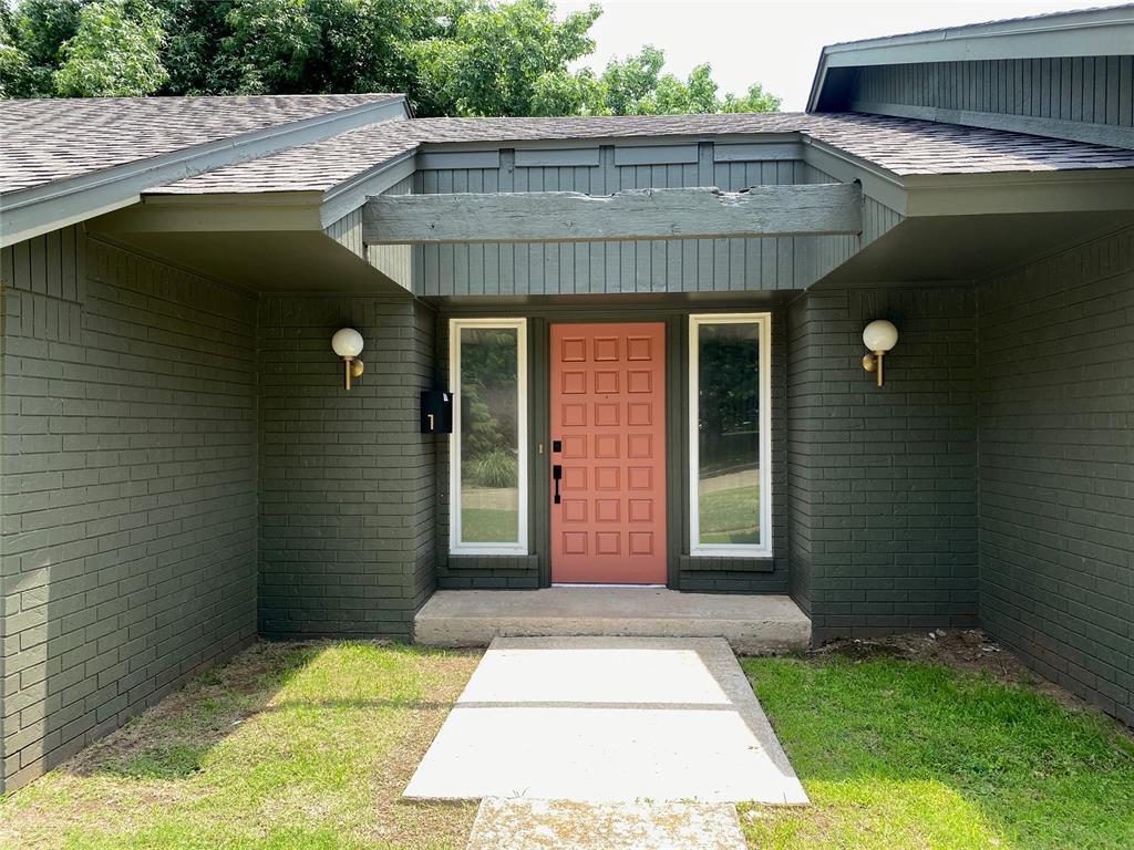 Available in June 2027! This recently renovated house has a cool mid-century vibe, a fantastic layout, and is newly landscaped. The front door opens into a flagstone entry hall, then steps into the large, sunken living room with a vaulted ceiling, wood beams, fireplace, and built-in bar with new granite countertops. To the right is the kitchen, dining area, utility room and garage, to the left are 3 bedrooms and 2 bathrooms, and through the living area is the shaded back patio and yard. A washer and dryer are provided in the utility room. The landlord provides landscaping and mowing. The tenant pays all other utilities. This is a no-pets and a non-smoking property. The new lease will go through May 31st, 2028.