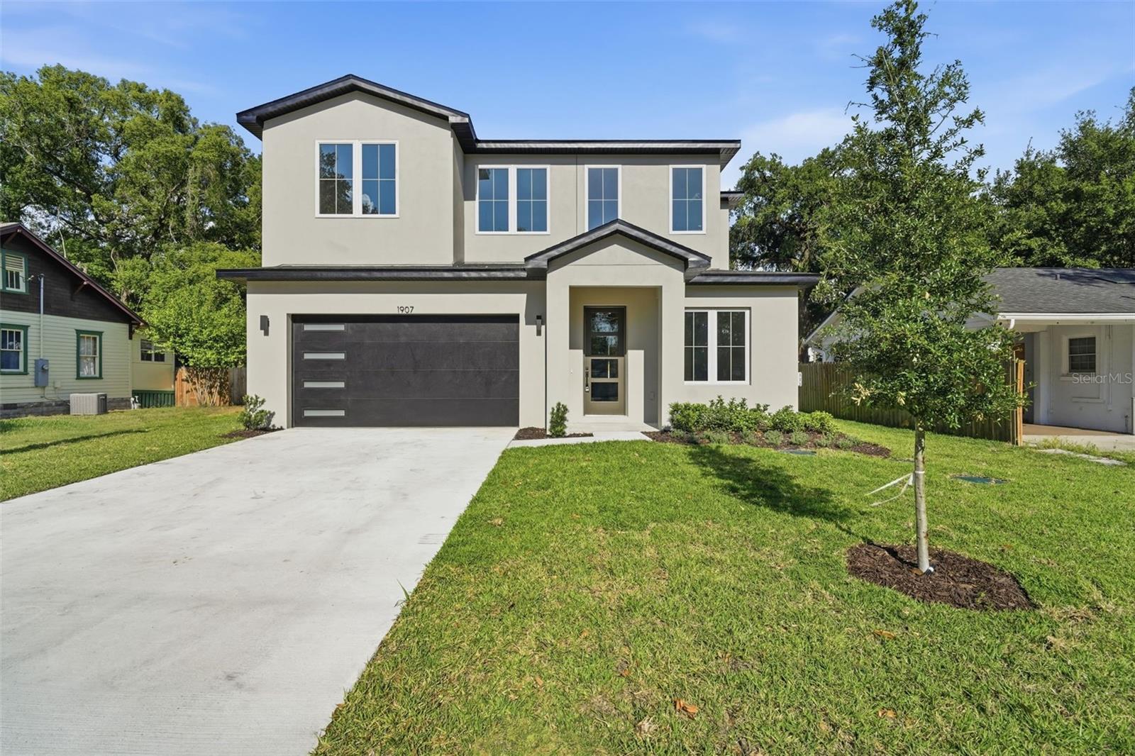 Welcome to this stunning new construction home offering the perfect blend of modern design and prime location. Situated on a spacious 0.19-acre lot, this 4-bedroom, 3.5-bathroom single-family residence delivers both comfort and style with no HOA restrictions. Step inside to discover a thoughtfully designed floor plan featuring generous living spaces, abundant natural light, and high-quality finishes throughout. The open-concept layout is ideal for both everyday living and entertaining. Outdoors, enjoy a spacious backyard with plenty of room to create your dream oasis—whether that’s a custom pool, garden, or play area. The oversized covered back patio is a true highlight, featuring beautiful tongue-and-groove ceilings, perfect for relaxing or hosting gatherings year-round. Conveniently located just 13 minutes from Downtown Orlando, this home offers easy access to dining, entertainment, and major roadways. Plus, enjoy the benefit of being just a block away from Hourglass Park, making outdoor activities and green space part of your daily routine. Don’t miss this rare opportunity to own a brand-new home in a desirable Orlando location with space, style, and freedom—schedule your private showing today!