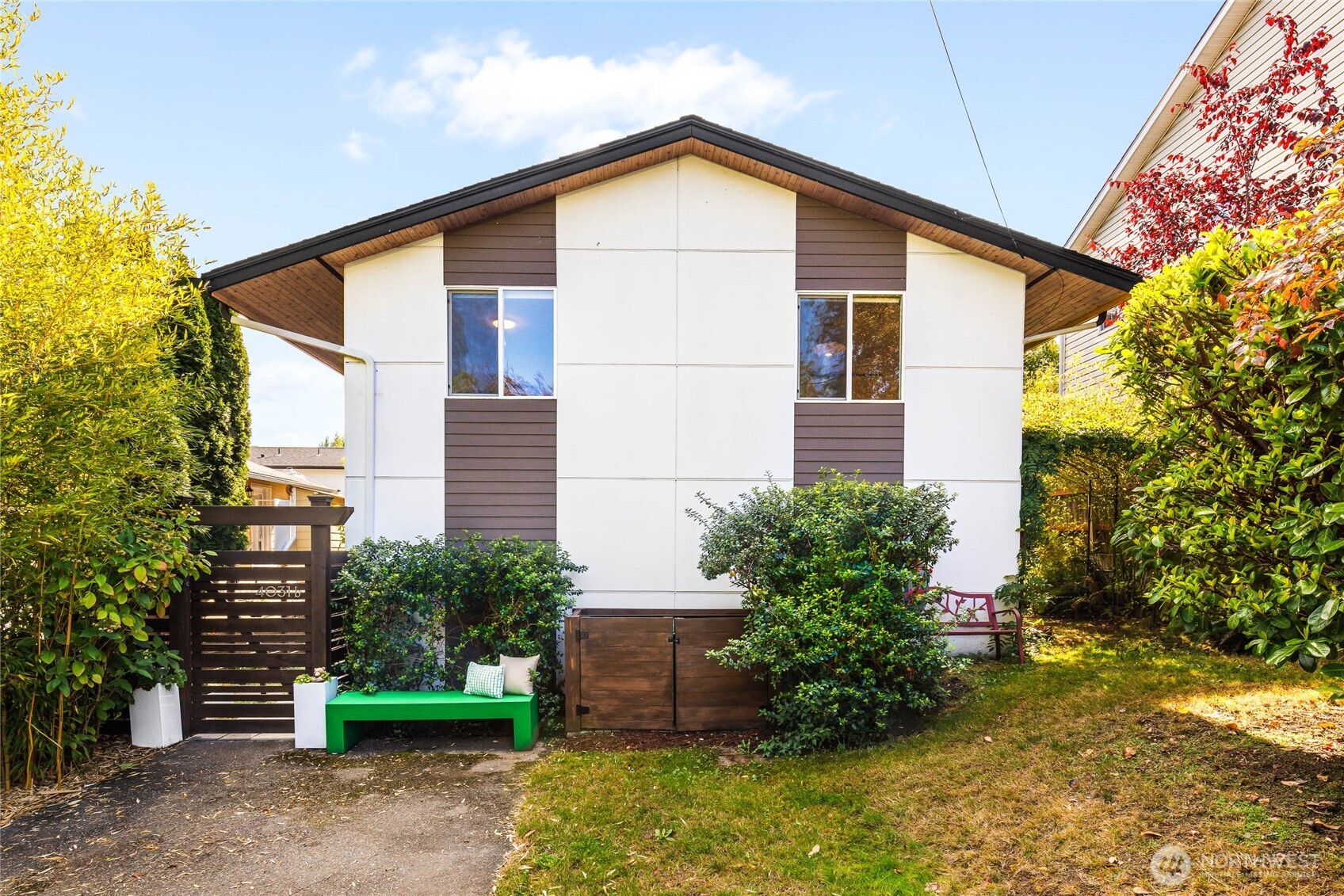 At the end of a quiet street, this freestanding residence enjoys a remarkably private setting in the heart of the city! Open-concept living, with high-end fixtures & finishes throughout, exceptional use of space, & outstanding natural light. Enormous kitchen with quartz counters, matching stainless appliances, and subway tile backsplash. Over $200K in updates & upgrades, including stunningly serene back yard by award-winning landscape architect Chad Wichers of Studio 342, remodeled bathrooms, LVP flooring, new doors, smart blinds in primary, & 9.86kW solar system, providing approximately 71% of the home’s power. Newer washer & dryer, insulation, wooden soffits, & gutters. Potential for DADU in front yard (survey completed). Barely half a mile to light rail. Popular parks in every direction. Not a townhome. No HOA. Minutes from shopping, dining, arts, entertainment, & everything vibrant Columbia City has to offer!