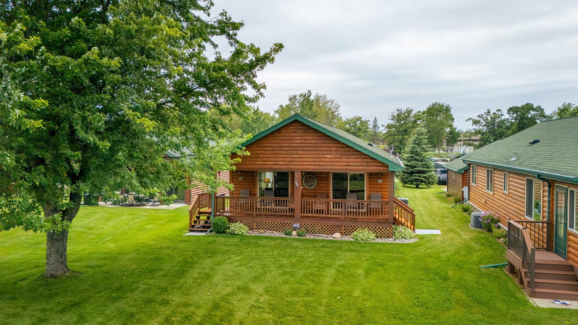 Discover lakeside living at Tom's Harbor CIC on Cass Lake! This 3BR/2BA, one-level gem offers an open floor plan, beautiful kitchen, cozy gas fireplace, in-floor heat, and a covered porch. Enjoy easy outdoor entertaining on the patio and direct access to your boat slip. Relax in a quiet, secure neighborhood with amenities like Tom’s swimming pool, recreation hall, fish cleaning house, and beach area. Say goodbye to mowing and snow removal hassles. Dive into the lake life with nearby Star Island, Lake Windigo, Cedar Island sand bar, and boat rides to local spots.