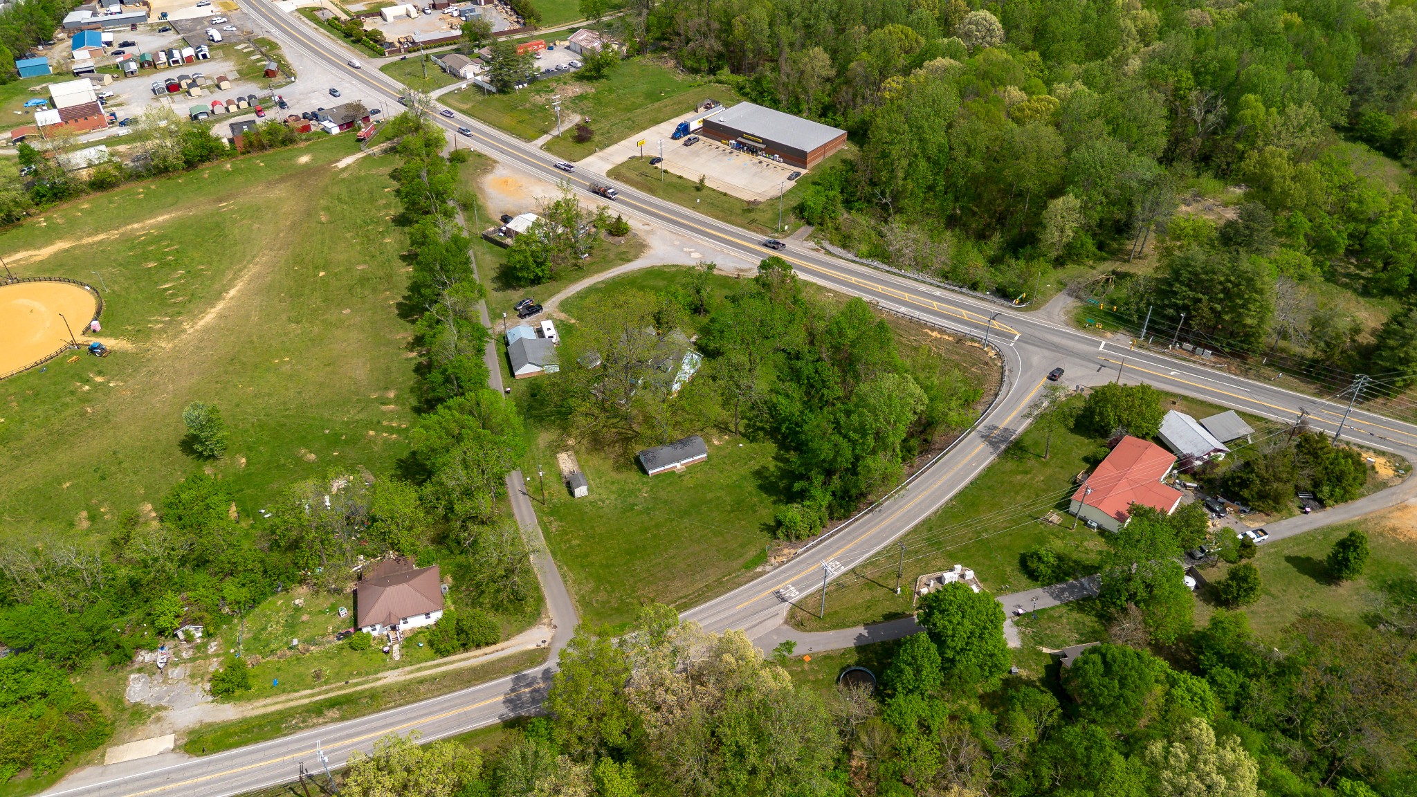 Prime Commercial Location!!  Over 2 Acres of Property That is Zoned Heavy Commercial But is Currently Being Used as a Residence...  Property Is In a High Traffic Area , Over 850' of Road Frontage Total, 206' on Bethel Rd. (AADT 4358), 323' on Hwy 31w (AADT 7461) & 366' on Old Louisville Hwy. Home has Endless Possibilities as Commercial Space or Tear Down & Build A New Commercial Structure to Fit Your Commercial Needs. Zoning Applications Are Attached in Media Section, Which Include But Are Not Limited To;  Gas Stations, Car Dealership, Animal Hospital, Car Wash, Storage Facility, Heavy Retail & Rental Services & Much More.