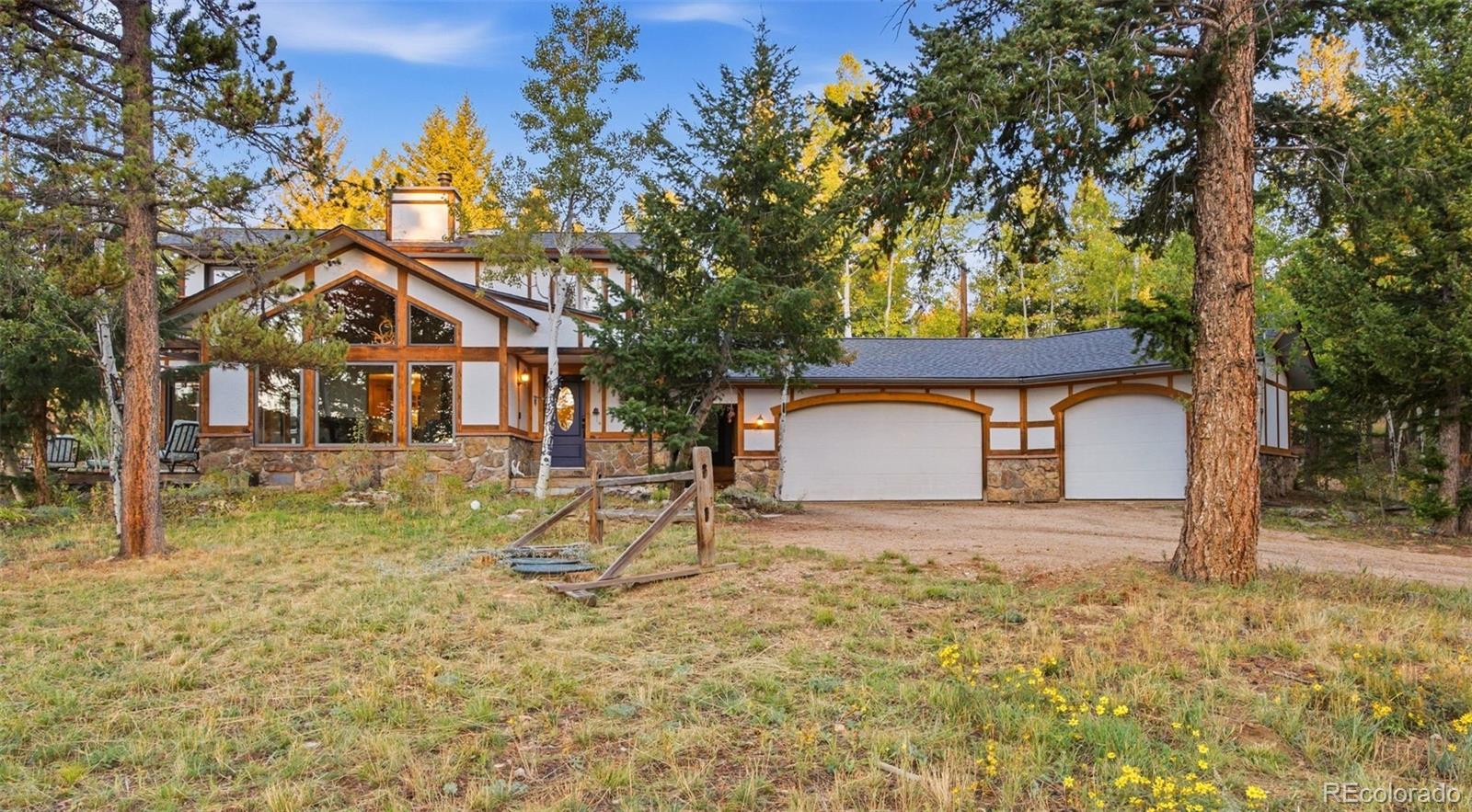3.75 southern-exposure acres that feel like 300! This exceptional mountain property offers a 500-foot nature trail bordering Boulder County open space, leading to a dramatic rock outcropping and staircase where spectacular views await, including Eldora Mountain Ski Area, the Continental Divide, James Peak, and Arapahoe Peak.Inside, abundant natural light fills the home through beautiful windows, highlighting the inviting kitchen, quality finishes, and warm mountain-inspired interiors. Enjoy direct access to hiking, skiing, and year-round outdoor recreation, with the unique charm and amenities of Nederland nearby. Just 30 minutes to downtown Boulder.