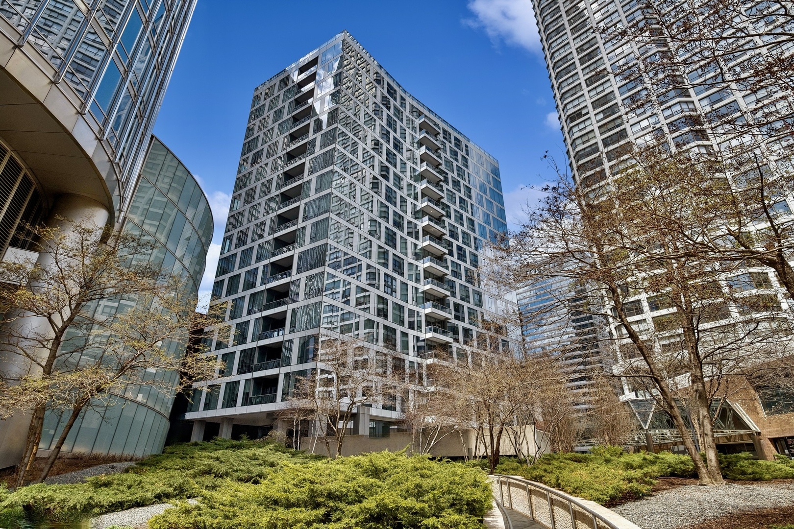 Situated at the River and surrounded by Chicago's iconic architecture, this enviable address is within walking distance to the best of downtown Chicago. This gracious floor plan features three bedroom, three bath, stunning city and river views from each room and terrace, Waterworks fixtures, gallery walls for art lovers, master bath with Victoria and Albert freestanding tub, and  Snaidero kitchen featuring Wolf and Subzero appliances. Building amenities include 24-hour door staff, state -of-the art fitness center with private yoga room, bicycle storage and a dog run. The well-appointed penthouse level features a private rooftop lounge with game room, media room, indoor and outdoor kitchens and an outdoor terrace with fireplace set against spectacular views of the skyline and river. 1 garage parking space included in the price. Can be sold fully furnished.