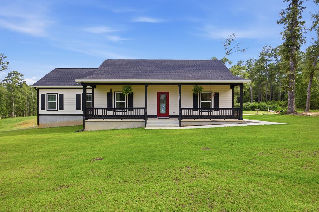 Custom New Construction on 3 acres! Experience the perfect balance of refined living and peaceful country surroundings in this exceptional custom-built 2025 home, ideally situated off Meridian Road across from Rosemary Plantation on the Florida-Georgia line, just a short drive to Tallahassee. This thoughtfully designed 3-bedroom, 2-bath residence showcases quality craftsmanship throughout. The kitchen is highlighted by one-of-a-kind reclaimed wood countertops crafted from historic timber dating back to the 1800s, recovered from the Apalachicola River, and complemented by a full granite backsplash, stainless steel appliances, and a gas range. Luxury vinyl plank flooring extends throughout the home, offering both elegance and durability. The private owner's suite is a true retreat, complete with a spacious walk-in closet and a spa-inspired bath featuring dual vanities, a walk-in tiled shower with a rain showerhead, and a freestanding soaking tub. A generously sized laundry/mudroom includes a washer, dryer, and abundant storage. Designed for entertaining, the backyard is highlighted by a new saltwater pool and an impressive 1,000-square-foot screened enclosure with accent lighting, creating the perfect setting for gatherings or quiet evenings. Surrounded by nature, you'll enjoy the peaceful sounds of owls and whip-poor-wills while taking in the beauty of your private 3.05-acre homesite. Horses are welcome, offering endless opportunities to embrace the country lifestyle without sacrificing the convenience of nearby Tallahassee.