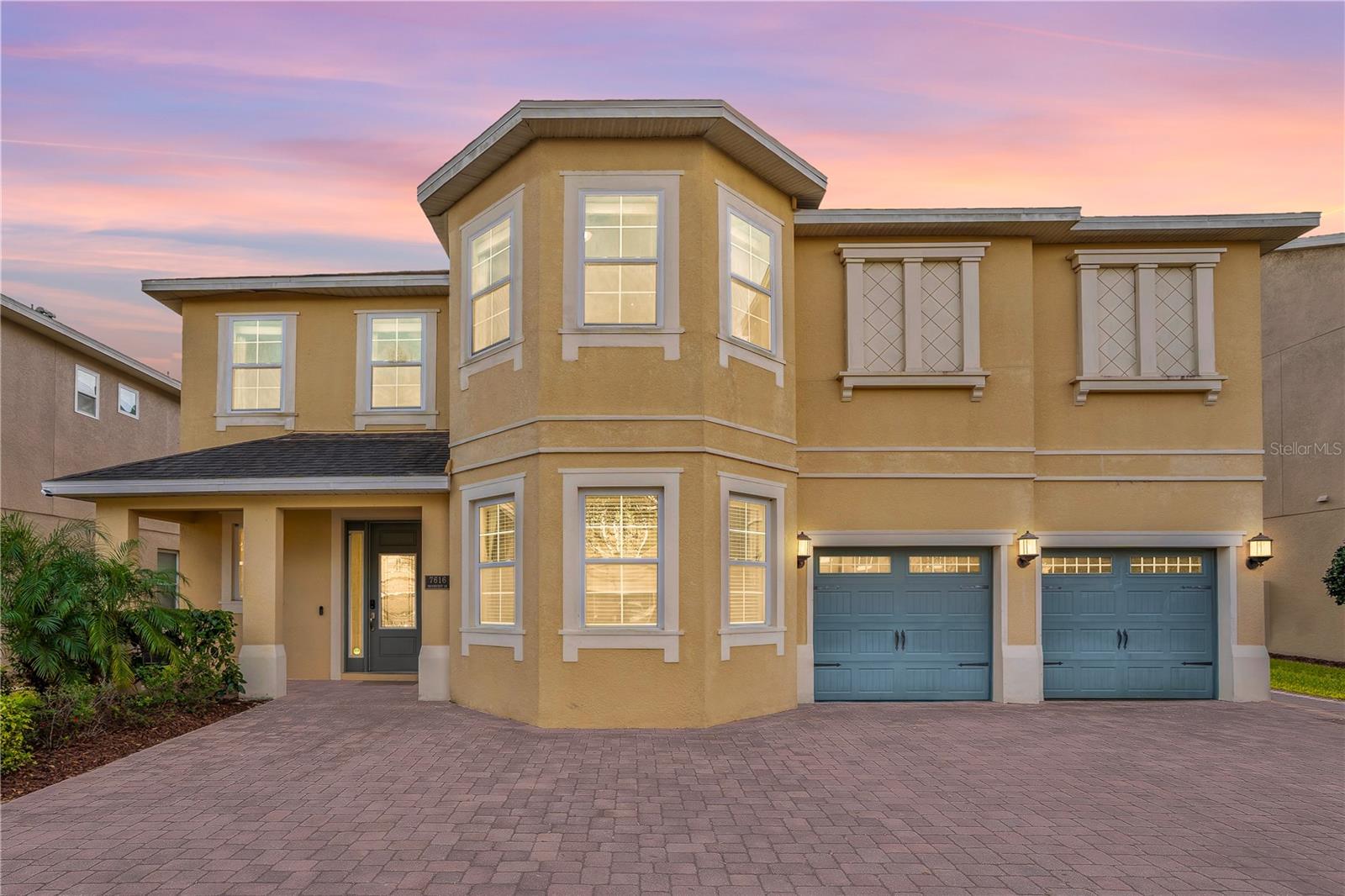 EXCEPTIONAL VALUE OPPORTUNITY IN ENCORE AT REUNION.?This expansive 11-BEDROOM, 13-BATH resort-style estate, one of the LARGEST floor plans in Encore, presents a rare chance to acquire a HIGH CAPACITY luxury short-term rental at rock-bottom pricing, complete with a $50,000 SELLER CONCESSION to enhance presentation, personalize theming, and accelerate future returns.Designed to accommodate up to 33 guests, the home shows projected gross revenue potential of approximately $148,000 annually once themed and optimized, making it a standout opportunity for investors seeking scale, flexibility, and long-term profitability in a PREMIER DISNEY-AREA resort community.The concession allows the next owner to customize finishes, refresh paint, elevate curb appeal, and create a branded guest experience—a true blank-canvas advantage rarely available at this price point. No structural or functional work is required—just light cosmetic updates to unlock full earning potential.Beyond the investment upside, the home is designed to comfortably accommodate up to 33 guests, featuring 10 bedrooms with full ensuite baths, including THREE SPACIOUS PRIMARY SUITES; a private downstairs primary with dual walk-in closets and two additional primaries upstairs, each with access to the screened balcony. From the second floor, enjoy VIEWS OF DISNEY FIREWORKS and KENNEDY SPACE CENTER ROCKET LAUNCHES adding a truly magical touch for owners and guests alike.The heart of the home is a gourmet kitchen built for ENTERTAINING LARGE GROUPS, complete with GRANITE COUNTERTOPS, 42” shaker-style cabinetry, expansive breakfast bar seating, TWO STAINLESS STEEL REFRIGERATORS, TWO STAINLESS STEEL DISHWASHERS, a coffee bar, and a LARGE WALK IN PANTRY. The home is sold FULLY FURNISHED and the kitchen comes fully stocked with essentials.Entertainment options abound with a DEDICATED THEATER ROOM featuring stadium-style reclining seating, PROJECTION SCREEN, and projector, as well as an UPSTAIRS LOFT ENTERTAINMENT ZONE with pool table. HARDWOOD FLOORING on the stairs and second floor adds warmth and durability, while ceiling fans throughout enhance comfort. TWO LAUNDRY ROOMS upstairs and down add comfort and durability for high-occupancy stays.Outdoor living is equally impressive, highlighted by a LARGE PAVER PATIO, HEATED POOL AND HOT TUB, FENCED IN BACKYARD with tropical landscaping, and a covered lanai with outdoor grill—perfect for gatherings under the Florida sun. A BRAND NEW PROFESSIONAL GRADE OUTDOOR DINING TABLE AND CHAIRS complete the space.Additional features include three owner’s closets, tankless water heaters, dual A/C systems, a paver driveway, and ample closet space throughout.Located just a short walk from Encore’s exclusive amenities, you’ll enjoy access to a 10-acre waterpark with exhilarating slides, splash pad, poolside cabanas, fitness center, courts for tennis, volleyball, and basketball, a full soccer field, casual on-site dining and bar, a concierge desk, and complimentary transportation to Disney, Universal and Seaworld. The HOA covers internet, cable, landscaping, irrigation, pest control, community maintenance, and 24-hour manned security-simplifying ownership while maximizing returns.  INVESTOR READY. HIGH CAPACITY. CUSTOMIZATION FORWARD. Opportunities to acquire a home of this size, with this level of concession and upside, are rare in Encore. THIS VALUE_DRIVEN OFFERING WILL NOT LAST—schedule your private showing today.