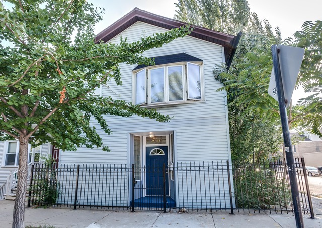 HUGE SF in the heart of Wicker Park. Perfectly habitable currently but some updates would go a long way. Huge 2.5 car garage with large storage loft. 2 spacious outdoor areas and room above the garage to finish. 24 x 100 RT-4 in case you want to tear down and start from scratch.  PLEASE REFER TO AGENT REMARKS FOR PICTURES AND FLOORPLAN.