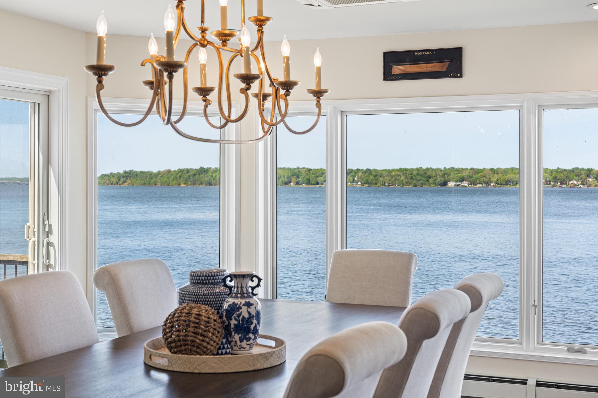 Available for the first time in a generation, this one-of-a-kind property provides the most captivating waterfront views in the Alexandria riverfront area.  Built with marine steel, brick and concrete, and 166 feet of river frontage, this 5,500 square foot house rises above the river, enabling sublime views from every corner of the land and the house.  A deepwater pier with slip and two boat lifts, privacy, quality nautical elements throughout, and separate guest house bring vacation living to you 365 days a year.  Multiple garage and covered parking spaces, private drive and southern border abutting the wooded land of River Farm add to the ambiance.  A private oasis just a 4 mile drive to Old Town via the scenic George Washington Parkway and just 10 miles to Washington DC.