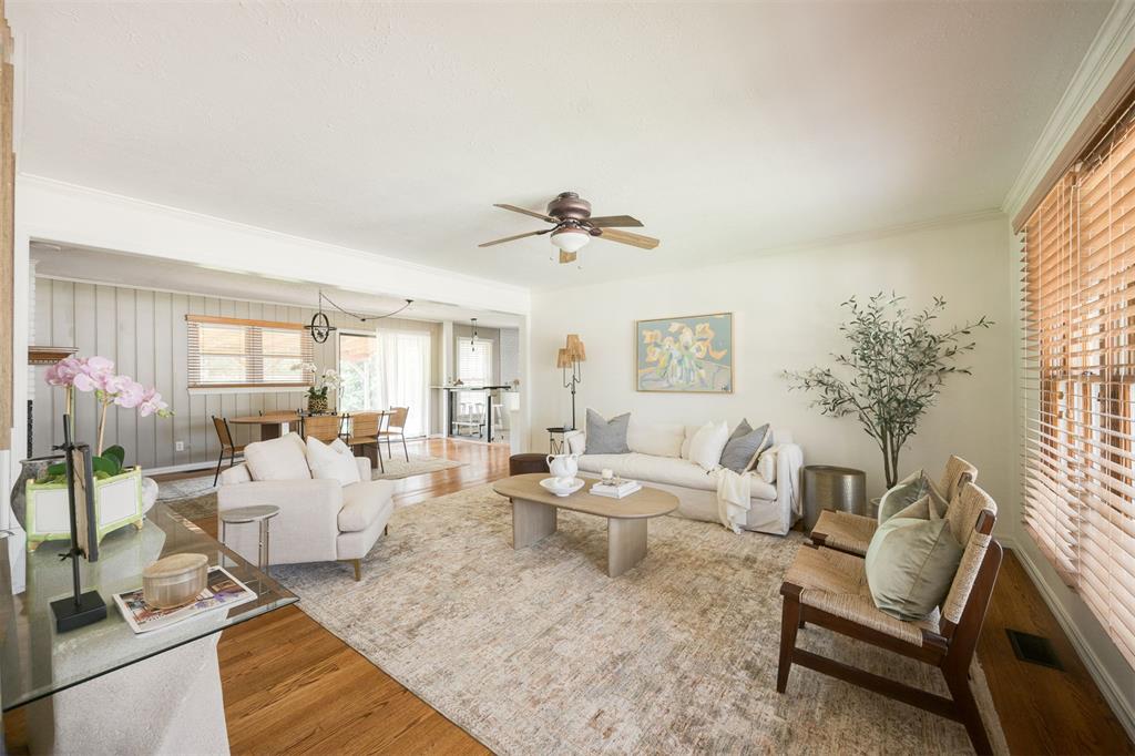 Located on desirable Kerry Lane in The Village, this home immediately stands out with its newly added interior laundry room for extra convenience! Beyond that, you’ll find a charming red brick exterior, inviting curb appeal, refreshed front landscaping, and a covered front patio perfect for enjoying your morning coffee. Inside, timeless red oak hardwood floors flow throughout a spacious living and dining area centered around a cozy fireplace. The beautifully remodeled kitchen showcases counter-to-ceiling backsplash, sleek quartz countertops, and thoughtful updates throughout. The home features two spacious guest bedrooms, a remodeled guest bathroom, and a generously sized primary bedroom with an updated en-suite bath. Fresh paint brightens the built-in cabinetry and several rooms, creating a crisp, welcoming feel. Ample hallway storage adds practical functionality. Out back, enjoy the updated covered patio—ideal for relaxing or entertaining year-round. Notable upgrades include a new EV charger, a 200-amp electrical panel, and a brand-new exterior sewer line for peace of mind. The kitchen refrigerator, washer, and dryer will also remain with the home. This property blends classic Village charm with smart modern improvements. Don’t miss the opportunity to make it yours!