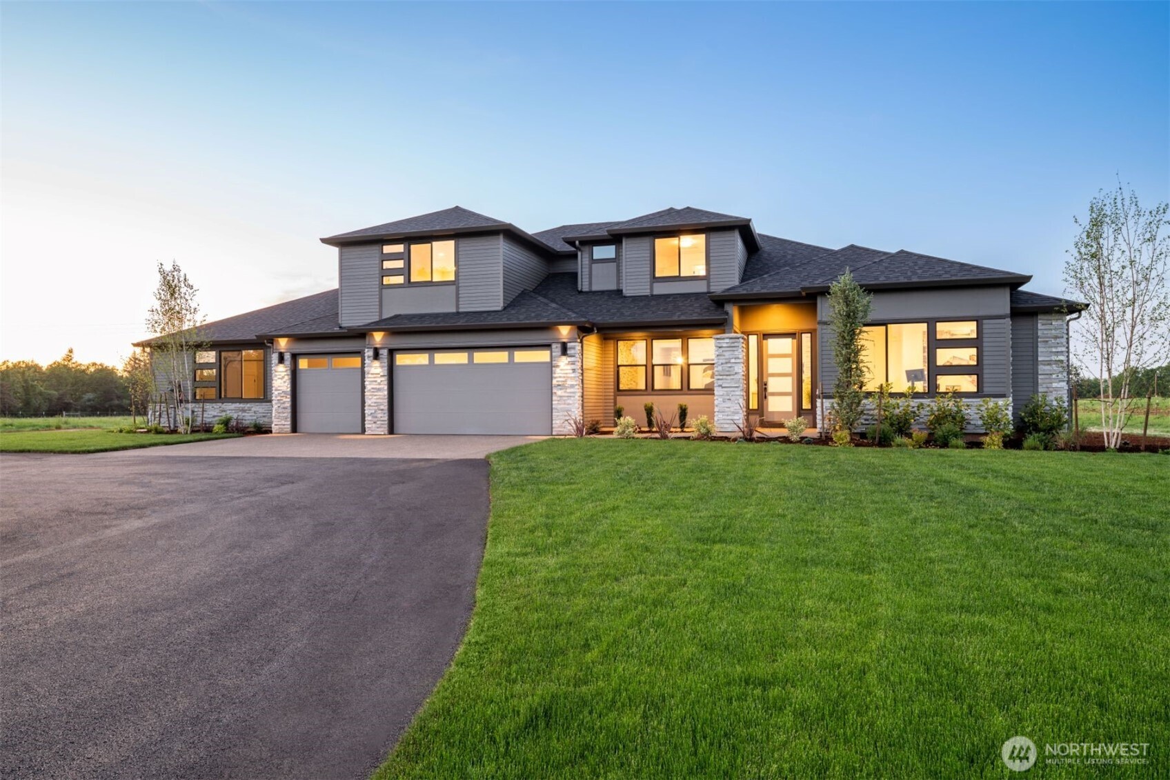 HOME TO BE BUILT — The SHASTA XXL Multi-Generational home at The Reserve at Washington National, built by the 2025 Seattle Times Builder of the Year, GARRETTE HOMES. Buyer to select structural options and design options at our design studio. This plan offers true main-level living with a Primary Suite on the main featuring a luxurious 5-piece bath, plus an attached fully independent multi-gen suite with its own entrance, patio, laundry, and garage. The main home includes 12' ceilings in the great room, a covered outdoor patio, den, and formal dining with a butler’s pantry. Situated on 1.15 acres in a premier golf course community. Photos are representative only. Learn more about this rare opportunity to build a semi-custom home today!