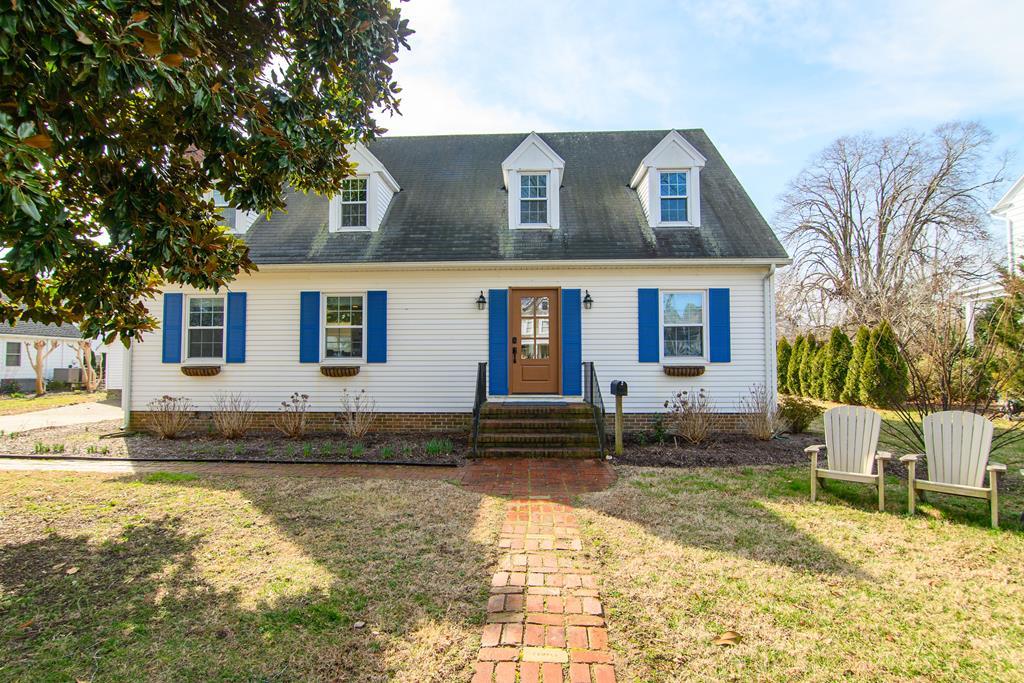 A rare offering in the heart of one of Virginia's most treasured waterfront towns, 12 King Street presents a beautifully updated home defined by quiet elegance & timeless character. The residence offers 3 private bedroom ensuites, an additional half bath, & an extraordinary kitchen with top-tier appliances & refined finishes, designed to elevate everyday living & gracious entertaining. A welcoming living room with a working fireplace provides a warm gathering space, while the expansive sunroom invites year-round enjoyment. Moments from the waterfront, dining, & galleries, this home offers the rare distinction of a refined, walkable coastal lifestyle...gracious, connected, & exceptional.