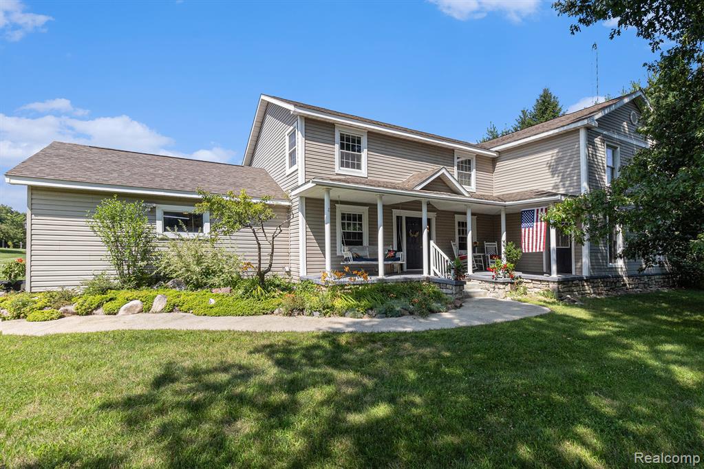 Great opportunity on this large colonial on a private and secluded 19.68 acres. The exterior of the home has great appeal with extensive landscaping, a covered front porch, and a two car side entrance garage with separate electrical service panel with 220 and heat. On the back of the home you will find a large screened in covered porch, cement patio with hot tub, and a fire pit. Currently the home is set up as a 5 bedroom utilizing a portion of the home (two private offices and additional workspace area) as a home office that can be closed off from the main home and has a private entrance from the exterior allowing for a distraction-free workspace. The home is very versatile, could be up to 7 bedrooms, if needed. There are hardwood floors in the large formal dining room and breakfast nook. Kitchen has plenty of cabinets and counter space. Main floor laundry has a walk-in pantry. Main floor also has a large living room with a stone gas fireplace and built-in book shelves. Upstairs features a large primary bedroom which includes an updated private bath with walk -in shower, beautiful views of the property, and lots of closet space. Second floor family room has a secret door/bookshelf which leads to a large playroom and additional bedrooms, adding a touch of whimsy and adventure. The overall layout of the home encourages togetherness, and also provides private spaces. This home showcases cutting-edge Energy Star rated efficiency that will save you money and provide a tranquil living experience. The 19.68 acres has a mix of woods and fields which were previously used for horses. Lots of deer, turkey, bunnies, and other animals call this place home. There is a permitted shooting range on the property that can be used by the new owners as they see fit. An additional 10 acres that could be for sale for someone wanting even more land.