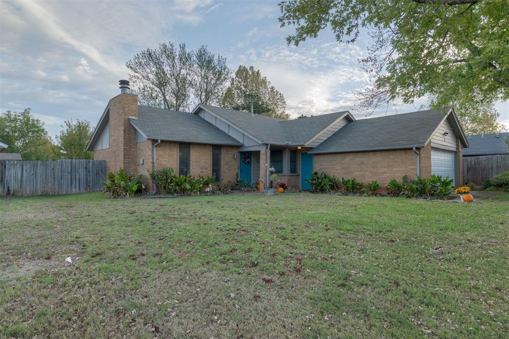 Charming, functional, and full of potential! Situated on an oversized lot in an established neighborhood, this charming three bed, two bath home in the heart of Edmond, offers a thoughtfully designed layout that maximizes space and comfort. Major updates include an oversized Goodman HVAC system (2023), Andersen windows throughout (2021), and an Andersen sliding glass patio door (2022) overlooking the expansive backyard, ready to become your dream outdoor retreat. A cheerful turquoise front door welcomes you into the tiled entry, while the living room impresses with a cathedral ceiling, exposed wood beam, and painted brick fireplace. The kitchen was remodeled in 2017 with stainless steel appliances, updated quartz countertops, hardware, sink, and faucet. Just off the living room and kitchen, a flexible dining space offers beautiful backyard views and creates an easy flow for indoor and outdoor entertaining. The primary suite features a walk-in closet and an ensuite bath updated in 2017, while the secondary bedrooms offer generous space and ample closet storage. An oversized two car garage and Edmond schools round out this inviting home, offering comfort, versatility, and room to make it your own!