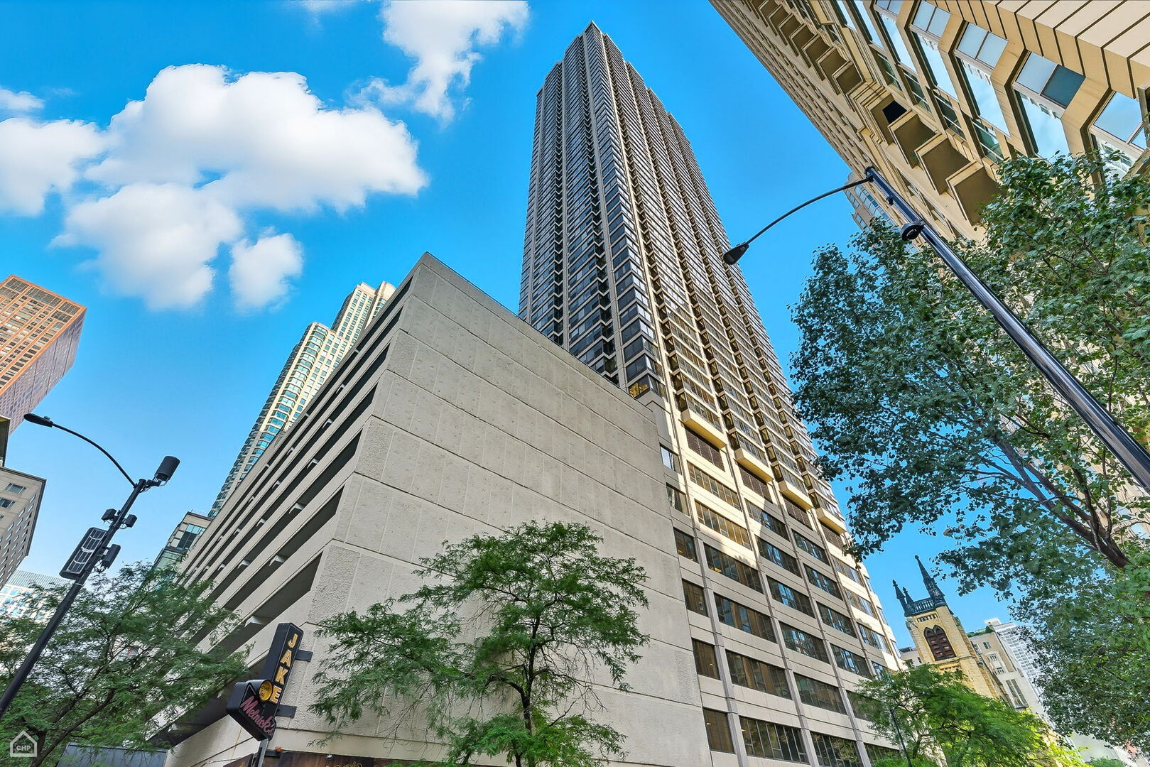 Step into this breathtaking North East corner unit on the 43rd Floor! Where every window frames the mesmerizing Chicago Skyline and clears the surrounding buildings to allow for East and North, Lake Michigan views! Truly WOW views! Enjoy a flowing split bedroom floorplan with open concept kitchen, separate dining area and in-unit washer/dryer. The kitchen offers shaker cabinetry, stone counters, stainless appliances and island with a breakfast bar. Bonus upgrades to the unit includes 19 triple pane windows with upgraded wood window surround insulation to allow for lower utility bills and sound a soundproof environment: Live among it ALL without hearing it ALL! Indulge in the building's extraordinary amenities: a recently updated sundeck complete with gas grills for poolside barbecues, 24-hour gym, an exclusive movie theatre room, a vibrant recreation room with a pool table and comfortable seating, attentive 24-hour door staff, and so much more! Elevate your lifestyle in this stunning City retreat! Garage parking available for $30k.