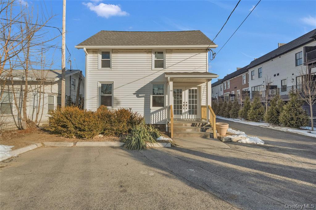 A Gem in Armonk, centrally located in the center of Armonk. There are two structures on the property. Main Building can be used for commercial space. On the second floor with a separate entrance  offers a 1 bedroom, eat- in kitchen, living room, full bath. Accessory cottage located on the property offers:  Vaulted ceilings, wood-burning stove, kitchenette, Bedroom, Full Bathroom, Large finished loft for storage, level private yard. Ample storage in both buildings. parking for about 10 cars