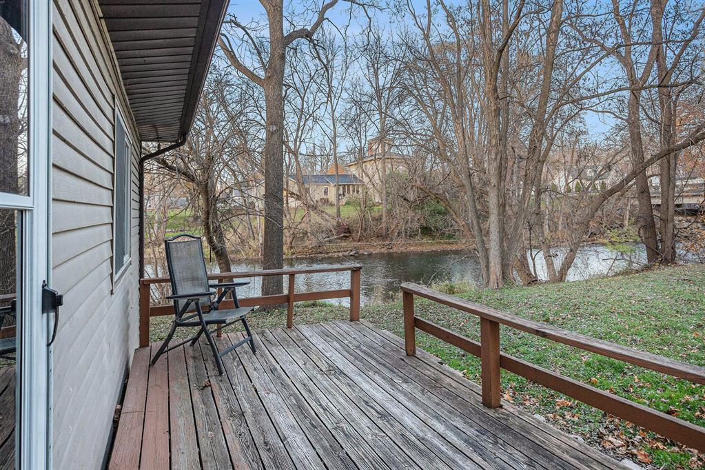 Beautiful two-story house right on the river, offering serene views and a relaxing atmosphere. Nestled in a friendly small town, this home features 3 bedrooms, 1 full bath and one-half bath.  Enjoy the river while sitting on the deck or get your kayak and head out on the river.