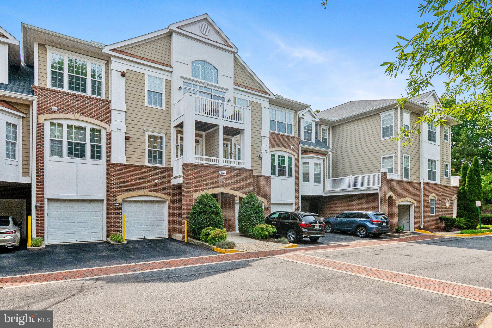 Penthouse living meets serene privacy in this meticulously maintained 2-bedroom, 2-bathroom condo in the desirable Hiddenbrooke community. Boasting 1,676 square feet of bright, comfortable living space, Unit 404 is completely move-in ready with gleaming hardwood floors and fresh paint throughout.Tucked into a quiet corner of the top floor, this penthouse offers elevated tranquility and an abundance of natural light. The welcoming foyer opens to soaring 9+ foot ceilings and a spacious living room complete with elegant crown molding, a cozy fireplace, and access to a private, 9-foot-deep balcony backing directly to peaceful woods—perfect for relaxing or entertaining.The flexible, open floor plan features a dedicated dining area that can easily serve as a den or home office, plus an additional sunlit nook off the kitchen ideal for a sunroom or casual dining. The primary suite is a private retreat boasting multiple closets—including a spacious walk-in—and an en-suite bath with a large vanity, soaking tub, and separate shower. A generous second bedroom, full guest bath, and a dedicated laundry room off the entry complete the layout.Convenience & Amenities:• Parking: Includes a 1-car garage (Interior Access Door #9 off the hallway; garage door is immediately left of the building entrance) plus one parking spot in front of the garage.• Building Features: Secure elevator building with stairwell for easy top-floor access.• Hiddenbrooke Community: Enjoy regular social events, a community center with meeting spaces, a kitchen, an exercise room, and a library.• "The Bistro": Located just across the street, featuring an outdoor patio and grill for community gathering.Prime Location:Ideally situated with rapid access to the Fairfax County Parkway, I-395, I-495, and I-95. Enjoy an easy commute to Fort Belvoir, local Metro stations, bus routes, and commuter lots. Minutes from premier shopping, dining, Springfield Golf & Country Club, and the parks of West Springfield.