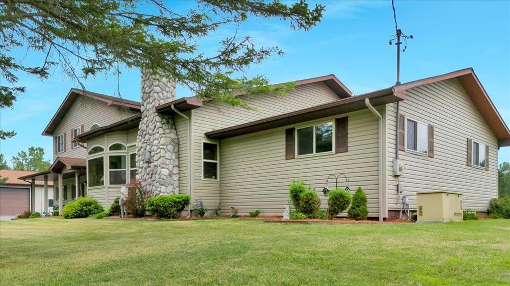 Pull up to this showstopper on a paved road and black-top drive, and savor the scenery of this gorgeous home under shade trees. Whether you are looking to upgrade and upsize or retire on a peaceful plot of acreage, 1369 E. County Line Road could make those dreams a reality! This property is, without a doubt, the jewel of Ogemaw County! An expansive 3,229 square foot home is situated on beautifully manicured 23.31 acres. With a truly open floor plan, holiday gatherings can be spent around the fieldstone, gas fire-place; afterwards, you can retreat to your private upstairs primary suite. A spotless jacuzzi room steps out onto a huge composite deck with tranquil views galore! Walk or ride the trails past the pond and into wooded areas - theres even a deer blind and food plot! This property boasts an immaculate 5882 square foot garage complete with a bar, office area, automotive bays, and even a paint booth! With infrared heat, it is an impressive space for your car projects, collections, and/or toys! AND for equestrians, theres a 50 x 50 horse barn including four 12 x 12 stalls (complete with concrete floors, drains covered with treated wood, a hydrant, and a tack room)! A 24 x 32 storage building with a 12 foot lean-to complete this property.