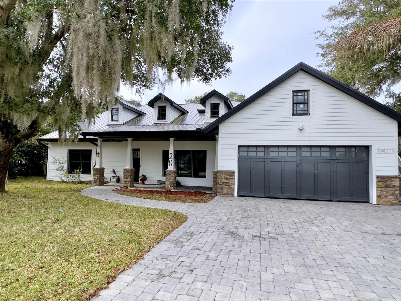 Welcome to 20 Oakdale Street, an exceptional waterfront luxury residence in the highly sought-after Town of Windermere with direct access to Lake Down and the Butler Chain of Lakes offering an ideal blend of elegance, privacy, and Florida lifestyle, this beautiful home is perfectly positioned to enjoy the area's charming small-town atmosphere while remaining just minutes from world-class dining, shopping, golf, and attractions * Incredible backyard * Summer Kitchen with Pizza Oven * Firepit with Stone Seating * Boathouse * Viking 6 Burner Gas Cooktop * Viking Fridge * Built in 2004 * 2 Suites on 1st Floor * Step inside to discover spacious living areas filled with natural light, soaring ceilings, and thoughtfully designed spaces perfect for both everyday living and entertaining. The well-appointed kitchen flows seamlessly into inviting gathering spaces, while the generous bedrooms provide comfort and privacy for family and guests. * Outside, enjoy your own private retreat with beautifully landscaped grounds, ample outdoor living space, and the opportunity to experience everything that makes Windermere one of Central Florida's most desirable communities. Whether relaxing by the pool, hosting friends, or taking advantage of nearby lakes and recreation, this home offers the lifestyle you've been searching for. * Located within close proximity to top-rated schools, renowned golf courses, the Butler Chain of Lakes, and just a short drive to downtown Orlando and major theme parks, this is a rare opportunity to own a premier property in one of Florida's most coveted addresses.
