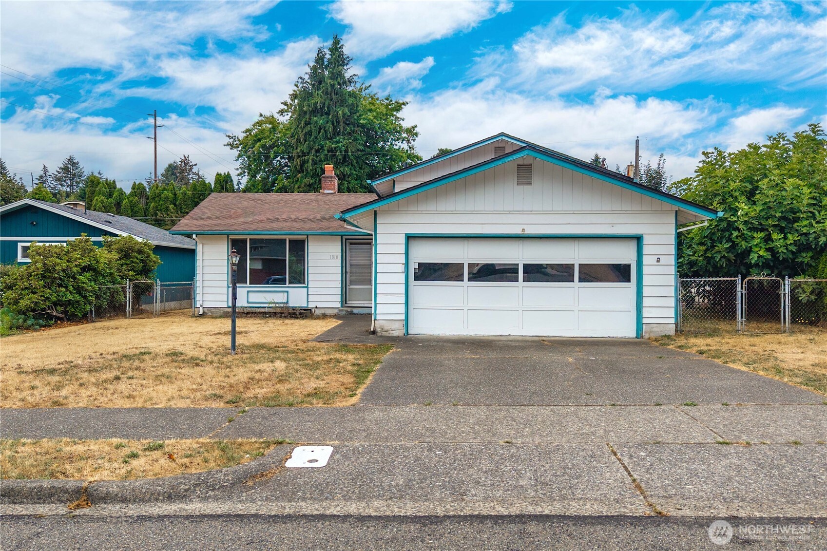 3-Level Living in desirable North Tacoma! Perfectly positioned near the Narrows Bridge, University of Puget Sound, Proctor District, 6th Ave, Ruston Waterfront, this classic Tacoma home puts some of the city’s favorite dining, shopping & recreation within easy reach. Inside, 1,934 sf offers room to spread out with 3 bedrooms, 2.5 baths, and multiple living spaces. Fresh interior paint & new carpet brighten the main level, where a wood-burning brick fireplace adds warmth & character. The kitchen pairs its original charm with newer stainless appliances, while downstairs is where the magic happens: a spacious rec / billiards room with wet bar, electric fireplace & separate entrance creates the ultimate hangout, game room or flex bonus space. All bedrooms are upstairs and several light fixtures are updated. Downstairs has an additional finished room that could be used as a home office, craft room, buyer's choice! Central AC keeps summers cool, while the covered patio & fully fenced oversized yard give you plenty of room outside. Attached 2-car garage, alley access, and potential for a future ADU add even more possibilities, buyer to verify. A home with space, personality & an incredible location to enjoy, right in the heart of Tacoma.
