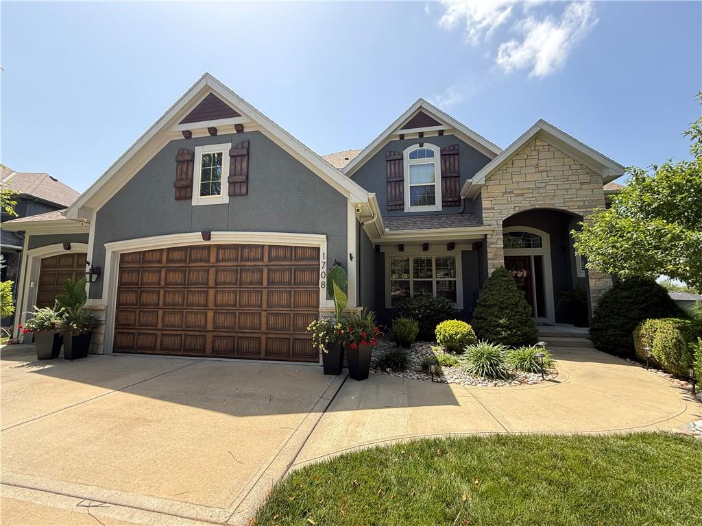 Tucked inside the prestigious Woodland Shores community, this beautiful home provides refined living in one of Lee’s Summit’s most sought-after lake neighborhoods. Surrounded by mature trees, peaceful water views, and beautifully maintained homes, this property blends privacy, lifestyle, and everyday convenience. It features a well designed floor plan with generous living spaces, abundant natural light, and seamless indoor-outdoor flow—perfect for both entertaining and comfortable daily living. Large windows frame scenic surroundings, while the open layout creates a warm and inviting atmosphere. The kitchen anchors the home with ample cabinetry, a huge walk in pantry and plenty of space for gatherings. The primary suite offers a private retreat with a well-appointed bath and walk in closets, while additional bedrooms provide flexibility for guests, family, or a home office. Situated in the highly desirable Lee's Summit area and within the amenity-rich Woodland Shores community, residents enjoy access to: Private lake privileges, covered 10 slip marina with dock, beautiful 4000 square foot community swimming pool, and offers quick access to great shopping centers & award-winning Lee’s Summit School District. This home delivers the perfect balance of tranquility and convenience and is more than a home — it’s a lifestyle.