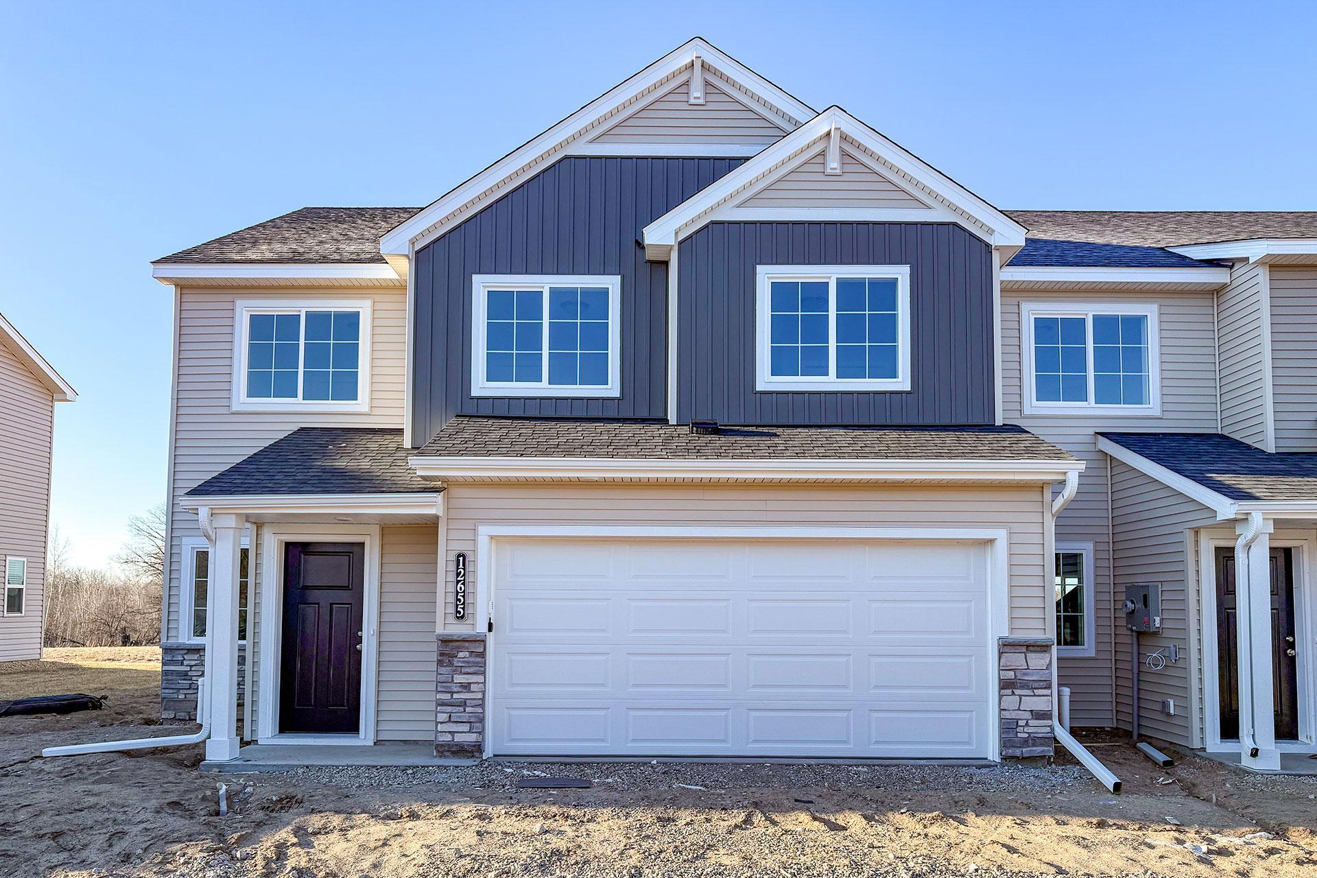 Welcome home to effortless living in this beautifully designed end-unit Hazelwood townhome by JP Brooks in Monticello's sought-after Meadowbrook community!Offering the perfect balance of style, comfort, and functionality, this move-in ready home is designed for the way you live today. As an end unit, you'll enjoy additional windows that fill the home with natural light while creating an open, airy feel throughout the main living spaces.The spacious open-concept floor plan makes everyday living and entertaining feel effortless. Gather around the fireplace on cool Minnesota evenings or host friends and family from the beautifully appointed kitchen featuring quarts countertops, stainless steel appliances, luxury vinyl plank flooring, painted on-site millwork, and thoughtful finishes that blend timeless style with everyday durability.Upstairs, the private owner's suite offers the perfect retreat with a spacious walk-in closet and private bath. Three additional bedrooms, bathroom and an upper-level laundry room provide flexible space for growing families, overnight guests, a home office, or your favorite hobby.Step outside and enjoy maintenance-free living with lawn care and snow removal handled by the HOA, giving you more time to enjoy everything Monticello has to offer.Located in the growing Meadowbrook community, you'll appreciate convenient access to Interstate 94, Highway 25, local parks, restaurants, shopping, and highly rated schools, making both your daily commute and weekend adventures effortless.Whether you're purchasing your first home, looking for more space, or simply ready for the ease of new construction, this move-in ready townhome offers modern finishes, energy-efficient construction, and the peace of mind that comes with owning a brand-new home. Schedule your private tour today and discover why Meadowbrook is one of Monticello's fastest-growing communities. Home will be completed September, 20 2026!