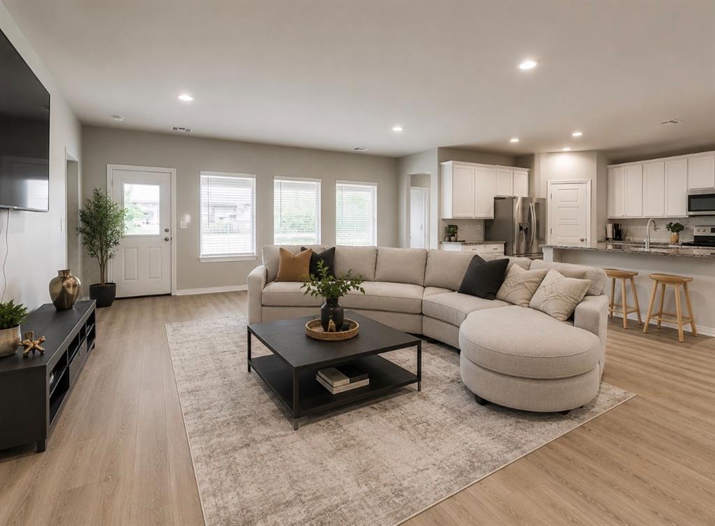 Located in the highly sought-after Deer Creek School District, this beautifully maintained home in the Falling Springs addition offers an exceptional blend of space, functionality, and community amenities. Residents enjoy access to a neighborhood pool, splash pad, and playground, adding to the appeal of this vibrant community. This thoughtfully designed floor plan features 5 bedrooms, 3 full bathrooms, and a versatile bonus room that can function as a home office, playroom, or optional 6th bedroom as it includes a closet and flexible layout. All bedrooms are generously sized with ample closet space, providing comfort and livability for family members or guests. The interior showcases fresh paint throughout and a mix of durable luxury vinyl plank flooring in the main living areas, with carpet in the bedrooms for added comfort. The open-concept design creates a seamless flow between the main living spaces, making it ideal for both everyday living and entertaining. The kitchen is the heart of the home, featuring a large island with granite countertops, stainless steel appliances including a gas range, built-in microwave, and dishwasher, along with a dedicated pantry for added storage. The open layout connects directly to the living room, enhancing the home’s functional and social design. Additional highlights include a large, covered patio overlooking the peaceful backyard, offering an ideal space for outdoor dining and entertaining. With its open layout, modern finishes, and desirable location, this home is truly move-in ready and built for comfort, convenience, and everyday enjoyment.