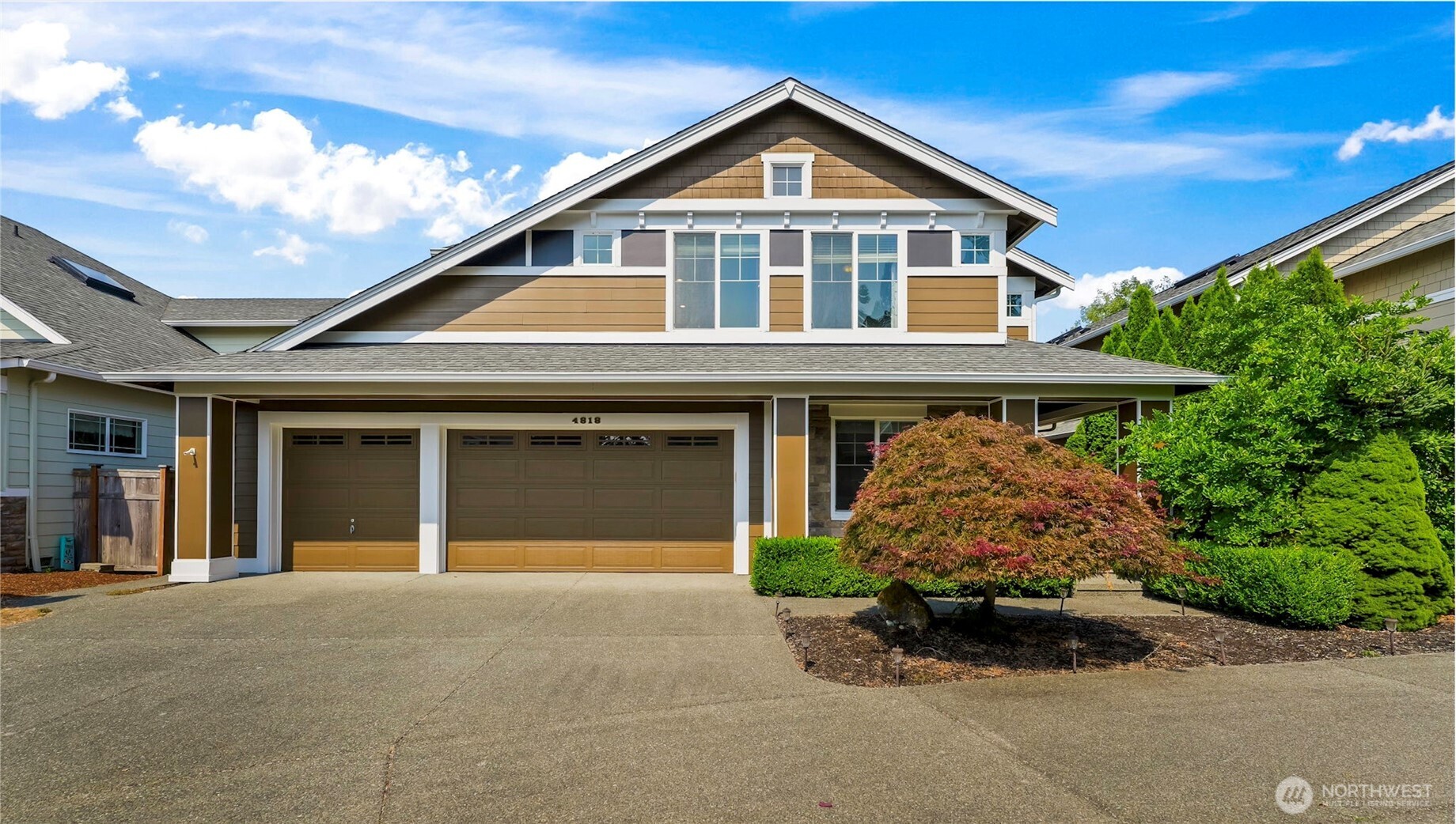 Tucked away in the East Renton Highlands, this meticulously maintained 4-bedroom, 2.5-bath home offers 3,110 square feet with an easy, comfortable flow and space for everyone. Natural light fills the home, highlighting the real hardwood floors and beautiful woodwork throughout, while fresh paint, new carpet, and newer mini-splits make it feel wonderfully cared for and move-in ready.  The living room is anchored by a cozy gas fireplace and built-in entertainment center, creating an inviting place to settle in or gather with friends. The living spaces flow easily into one another while still offering plenty of room to spread out. Additional features include a built-in stereo system ready for use. The fully fenced backyard gives you even more space to gather, entertain, or simply enjoy being outside.  And the neighborhood is such a lovely part of living here. Quiet streets make evening strolls easy, with HOA-maintained parks and basketball courts nearby. Shopping, restaurants, and plenty of outdoor recreation are all within easy reach, while the home itself feels nicely tucked away from it all. Beautiful, spacious, full of natural light, and incredibly well cared for, this is a home that feels good to come home to.