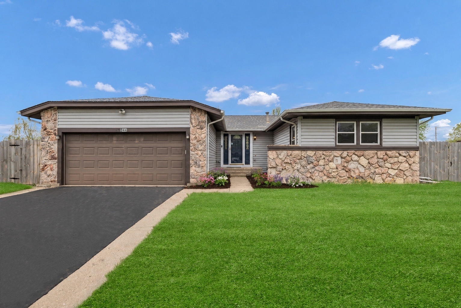 Tucked at the end of a quiet cul de sac, this home offers privacy while still being close to everything you need. Inside, you'll find new luxury vinyl plank flooring, a remodeled kitchen with new appliances, updated bathrooms, and fresh paint throughout, creating a clean, move in ready feel. The main living area features a fireplace that adds warmth and comfort, along with a nice master suite for added space and privacy. The full walk out basement adds extra living potential, while the backyard flows from a composite deck to a patio, making it an easy extension of the home for everyday living or entertaining.
