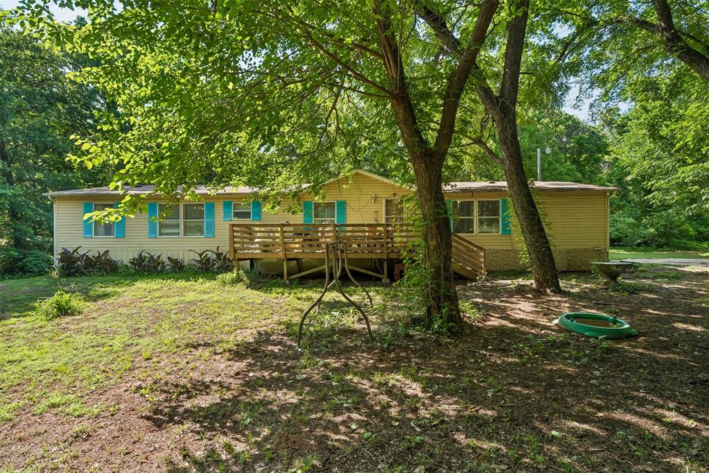 Hard-to-find acreage opportunity with endless potential. Situated on approximately 2.3 acres, 220 Floyd Avenue offers the space, flexibility, and privacy that buyers are constantly searching for but rarely find. Whether you’re looking for room to expand, space for equipment, future outbuildings, hobby use, or simply more distance from neighbors, this property provides a unique setup with countless possibilities. The large lot creates an ideal environment for someone wanting a more rural feel while still maintaining convenient access to nearby amenities, shopping, dining, and major roadways. There is plenty of room to customize the property to fit your needs and vision, making it an excellent option for investors, handy homeowners, or buyers looking for land with long-term upside potential. Opportunities with acreage like this do not come around often—bring your ideas and unlock the potential this property has to offer. Property is being sold as-is.