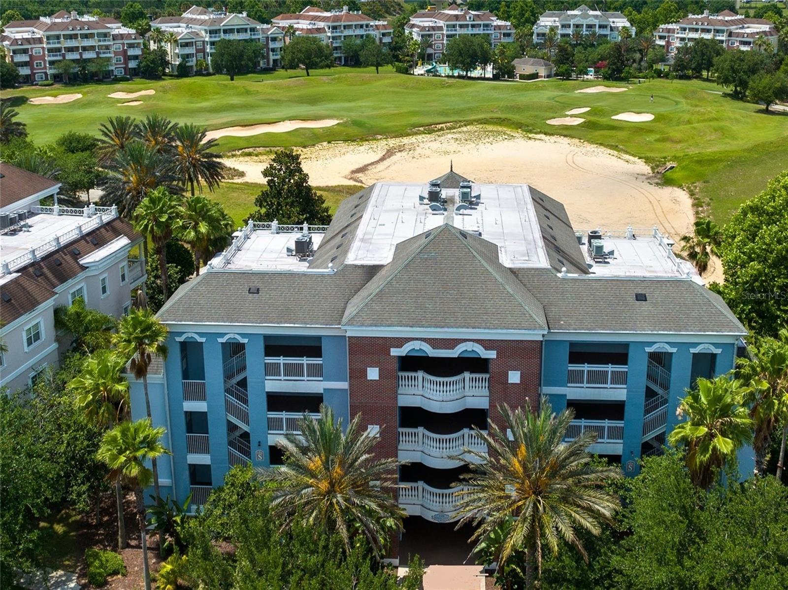 Vacation rental property with strong performance history - over $33,000 in rental income for 2024 and almost $12,000 for the first quarter of 2025 with future rentals in place. This lovely condo property sits right on the golf course in the ever-popular Villas at Reunion Resort, just six miles from the Walt Disney World entrance. You or your guests can step out onto a spacious second-floor balcony and look right out onto a private park and the Tom Watson signature course, the perfect setting for alfresco dining or a quiet moment of repose after a full day of activities. Inside, there’s nothing not to love with cool luxury vinyl flooring throughout and elegantly comfortable updated furnishings and décor – all of which are included so that the property is completely turnkey. A split floor plan with all bedrooms having their own en-suite bath assures privacy for owners and guests alike and the high-end finishes – crown molding, tray ceilings, solid wood cabinets amongst others – add to the overall feeling of relaxation and refinement. The condominium is laid out on one level and the building is also serviced by an elevator, so access is easy for all. Reunion Resort is a gated community offering a wide variety of amenities including six neighborhood pools, fitness center and a selection of on-property restaurants and lounges including an 11th-floor poolside restaurant with views of the Walt Disney World fireworks. Call us today for more details on this top performing rental property.