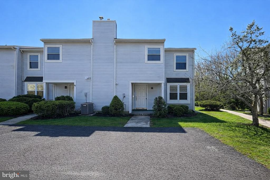 Welcome to 317 Hawthorne St, where space, potential, and opportunity come together in the heart of the desirable Marlton Village community. This spacious end-unit townhome offers approximately 1,665 square feet of living space, featuring 4 bedrooms and 2.5 bathrooms, creating a layout that is both functional and full of possibility.  From the moment you arrive, you’ll appreciate the charm of this established community and the convenience of parking just steps from your front door. Step inside and imagine the transformation—an inviting main level opens before you, where the living and dining areas flow seamlessly together, creating a bright and versatile space ready to be shaped into your ideal everyday retreat. Natural light fills the interior, enhancing the sense of openness and creating a warm, welcoming atmosphere throughout. The layout effortlessly connects each space, making it easy to envision gatherings with friends, quiet evenings at home, or a beautifully refreshed modern design tailored to your style.  Just beyond, the kitchen offers a practical footprint with ample space to reimagine and create the heart of the home. Whether you envision a sleek contemporary update or a cozy traditional design, the possibilities here are endless.  Upstairs, all four bedrooms are thoughtfully positioned on one level, providing comfort, privacy, and flexibility. The primary suite features its own private ensuite bath, offering a perfect foundation for a relaxing personal retreat. The additional bedrooms provide generous space for guests, work-from-home setups, or creative uses that adapt to your lifestyle.  Step outside to discover a private fenced rear yard—your own outdoor escape. The patio area offers the perfect setting for morning coffee, weekend gatherings, or simply enjoying a quiet moment outdoors. With fencing already in place, the space provides both privacy and a blank canvas for outdoor entertaining. As an end-unit, the home benefits from added natural light and a greater sense of openness, enhancing both the interior and exterior living experience. Ideally located near shopping, dining, parks, and everyday conveniences, this property combines location, layout, and opportunity in one compelling package. Whether you're looking to create your dream home or invest in a property with strong upside potential, 317 Hawthorne St is ready to bring your vision to life. Don't miss this opportunity! Schedule your private showing today! Photos are digitally enhanced. Being sold AS IS, WHERE IS, Buyer is responsible for all inspections, CO and certifications. All information and property details set forth in this listing, including all utilities and all room dimensions which are approximate and deemed reliable but not guaranteed and should be independently verified if any person intends to engage in a transaction based upon it. Seller/current owner does not represent and/or guarantee that all property information and details have been provided in this MLS listing.