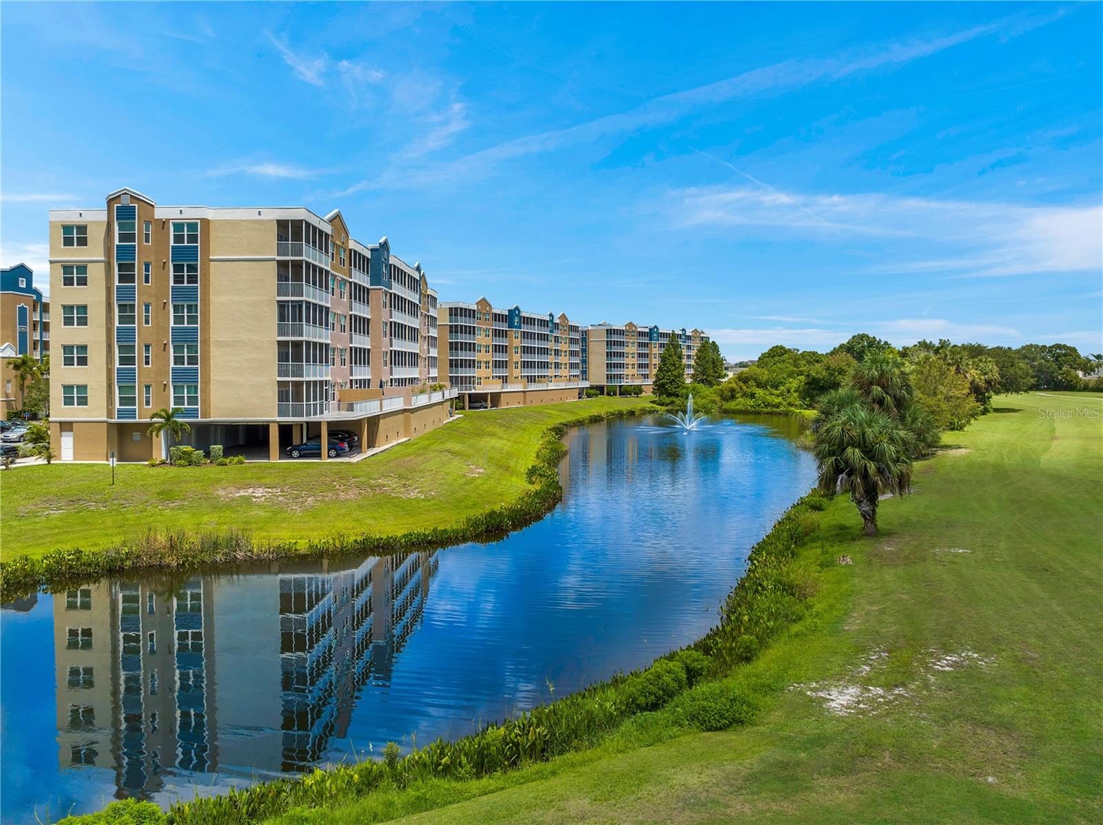 Truly PRIME, PREMIER, PREMIUM, PERFECTION both inside and out. Elevated with a private balcony with custom tile flooring, making it a one-of-a-kind, HIGH-CLASS HIGH-QUALITY RESIDENCE. Do you long for an IMMACULATE, BEAUTIFUL LAKEFRONT HOME? Do you desire a SAFE STUNNING SPECTACULAR Condominium?  Are you searching for a PEACEFUL and PRIVATE retreat in a SERENE SETTING to see spring fed lakes, green space, local wildlife and skies-ablaze sunsets? This stunning luxury residence offers all of that and more - your DREAM HOME may be waiting here for you! _____________________________________________________________________________________________________________________ 7205 features a spacious screened lanai providing panoramic views of the surrounding wetland wildlife. With 1,460 total sq ft (1,324 sq ft of living area), two generous size bedrooms, two elegant bathrooms plus included in the deed is OVER SIZED UNDER BUILDING PRIVATE GARAGE G-7 with remote control door. Golf Lake & Country Club boasts 490 condominiums, and GL 7205 stands out as ONE OF THE BEST of these exceptional modern homes. ______________________________________________________________________________________________________________________ This beautiful home has coastal decor accents with high-quality vinyl plank flooring throughout and a contemporary open layout with a large great room seamlessly connecting to a Euro-style kitchen. The kitchen features quartz countertops, top-of-the-line stainless steel appliances and shaker white cabinets. The expansive main bedroom suite is a true retreat, complete with two walk-in closets and a luxurious bathroom. The split plan offers privacy to the guest bedroom and bathroom with easy access to laundry & kitchen.  Imagine starting your day at the beautiful breakfast bar and later enjoying lunch or dinner at your high-top table beside the sun-drenched sliders with fabulous views of lakes and golf green space. _________________________________________________________________________________________________________________________ Located in the premium South-facing Building Seven of one of Pinellas County's most sought-after communities.  This condo is built to last with all-concrete construction - offering strength, security, and peace of mind in a high & dry location. The building is six years new, and the proactive HOA ensures top-notch maintenance, reserve funding, and management. The Golf Lake community offers resort-style clubhouse, including two pools and hot tub.____________________________________________________________________________________________________________________________ This home blends tranquility with accessibility. Conveniently located just minutes from shopping, dining, and top Tampa Bay attractions and world-class white sugar sand beaches. Golf Lake Condominiums has long been a hidden gem, but word is spreading fast. Looking for a fabulous dream home? This is an opportunity to make this picture-perfect Florida retreat property your primary residence or winter retreat.  Please call today to schedule your private showing.___________________________________________________________________________________________________________________SAFE - SOUND - STRONG - ELEVATED HIGH & DRY - NO SIRS OR MILESTONE ISSUES - NO EVACUATION NECASSARY - A GREAT HOME. ____________________________________________________________________________________________________________________________