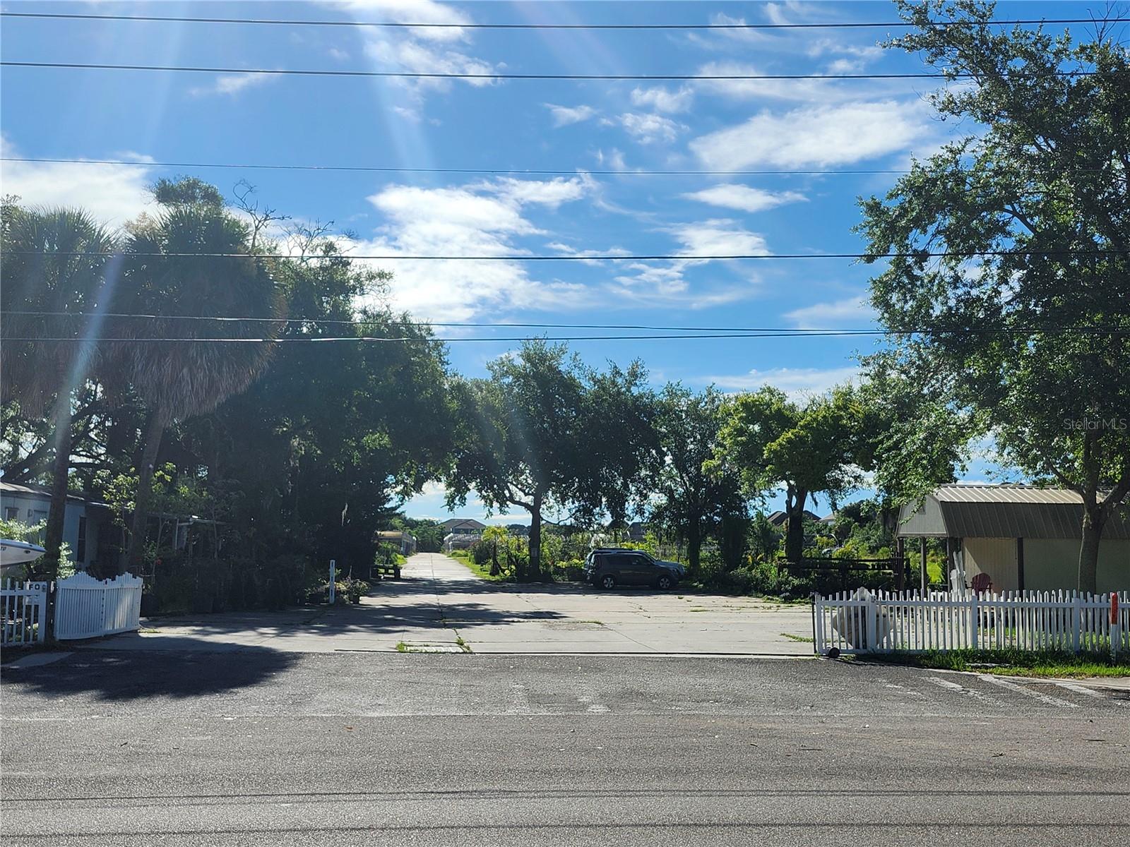 EXCITING OPPORTUNITY, just under 21 acres, adjacent to (East side) Windermere. Unrealized investment, commercial, residential or land bank potential. LAST LARGE PARCEL AVAILABLE. Terrific traffic count: 39,935 daily. Zoned Agricultural, un-incorporated with super visibility of nearly 700 feet frontage on Apopka Vineland Road.
Near major roadways.  multiple churches, restaurants, gyms, offices and shopping. Property is presently being operated as a retail nursery.
Selling as vacant land (No business). Buildings and machinery may be negotiated. Acreage includes 2 leased cell towers, on northern end.