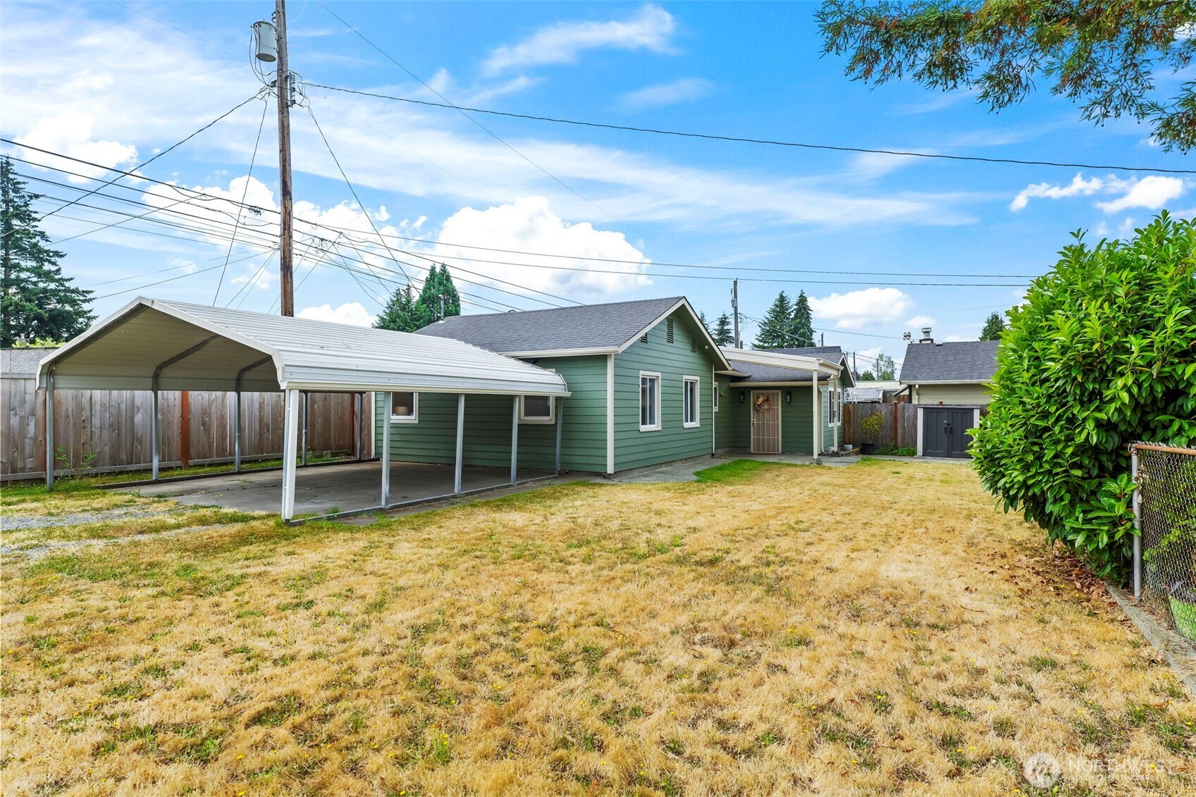 Welcome to this charming one-level Tacoma home, conveniently located near shopping, restaurants, schools, and freeway access! Cute, comfortable, and move-in ready with thoughtful updates throughout, including newer interior paint and flooring for a fresh, inviting feel. The functional single-level floor plan features 3 bedrooms, 1 full bath, a dedicated dining room, and utility room. Outside, enjoy a completely level and fully fenced lot with a gated entrance and plenty of usable space for gardening, pets, entertaining, or relaxing. A storage shed and covered carport add extra convenience. A great opportunity to enjoy easy one-level living in a convenient Tacoma location. Ask your agent for the seller-provided pre-inspection!