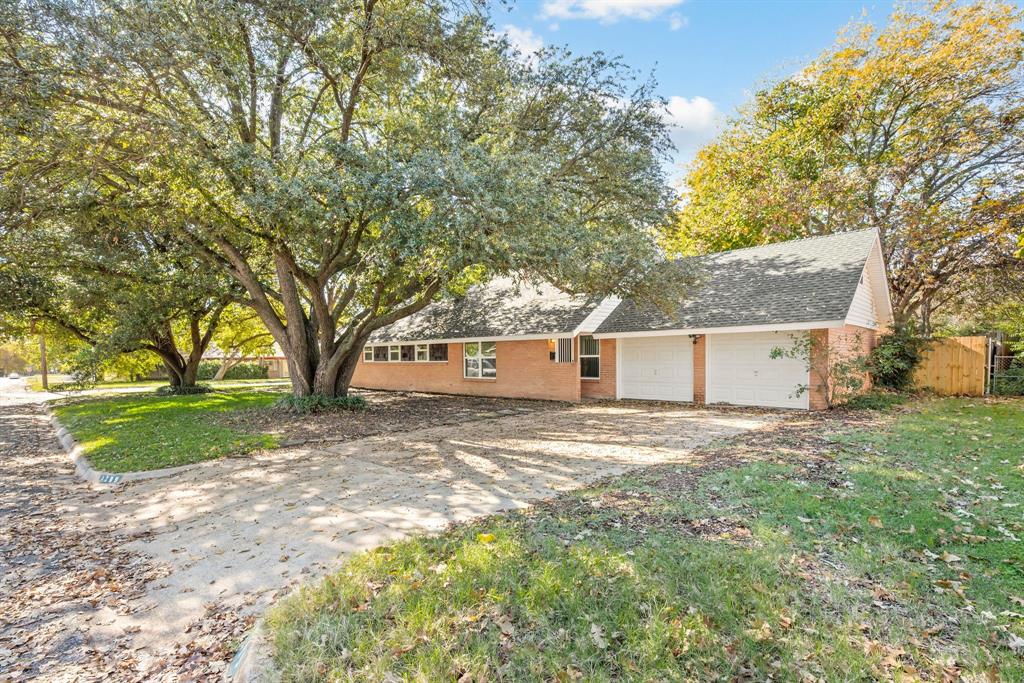 Discover the epitome of refined living in this meticulously renovated ranch-style home at 4209 Ashmore in North Richland Hills, Texas. Situated on a coveted corner lot, this property boasts an expansive, fully fenced backyard—a rare gem at this price point—offering unparalleled space for outdoor entertaining for family and pets. With double-gated access accommodating large trucks, RVs, or heavy equipment, it provides ample storage and versatility, while also serving as an idyllic setting for family gatherings and entertainment.Step inside to experience a seamless blend of modern elegance and functionality. The comprehensive renovation showcases top-of-the-line finishes throughout, including a stunning brand-new kitchen equipped with premium appliances and custom cabinetry. The bathrooms have been transformed with luxurious walk-in showers and high-end fixtures, ensuring spa-like serenity. Energy-efficient new windows flood the interiors with natural light, complemented by sleek LED lighting, pristine tile flooring, and fresh paint in every room. Adding to the allure is a versatile second-floor addition of 880 square feet (not included in the main footage), featuring an extra room adaptable as a fourth bedroom, home office, or playroom, plus dedicated storage space.Conveniently located just 15 minutes from vibrant Downtown Fort Worth, mere blocks from Loop 820, the North East Mall, and an array of shopping centers, with Creek Trail Park within walking distance, this residence strikes the perfect harmony of comfort, sophistication, and accessibility. Whether entertaining loved ones or savoring quiet evenings, it promises an elevated lifestyle. Schedule your private viewing today.