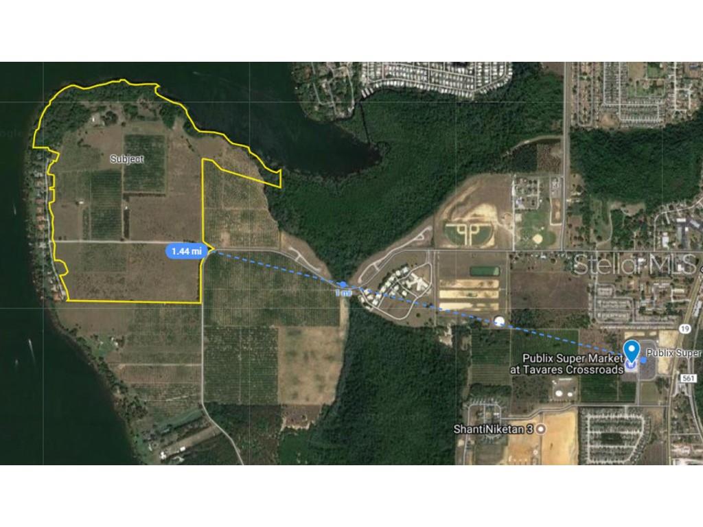This is an available 227.43 acres located with frontage on Lake Harris. The site has significant elevation changes and 1,600+/- linear feet of waterfront. The location is close to a Publix grocery located 1.4 miles away. Builders DR Horton and LGI Homes are active in communities that are almost adjacent to The Peninsula on Lake Harris. According to the property owners, the property has approximately 35 acres of wetlands with the remainder upland/usable. A wetland delineation has not been completed. Zoning and FLU allow for a density of 3 UPA. According to the property owner the site is entitled for 558 dwelling units 

Access to the Orlando MSA is via SR 414 to the north side of Altamonte Springs, Casselberry, and Winter Park. SR 50 runs into downtown Orlando. The Florida Turnpike is nearby for commuters to the area south of Orlando including Kissimmee and the Disney and Universal
entertainment district. Access to the property is facilitated via Woodlea Road or Lane Park Road off of Florida Highway 19.
