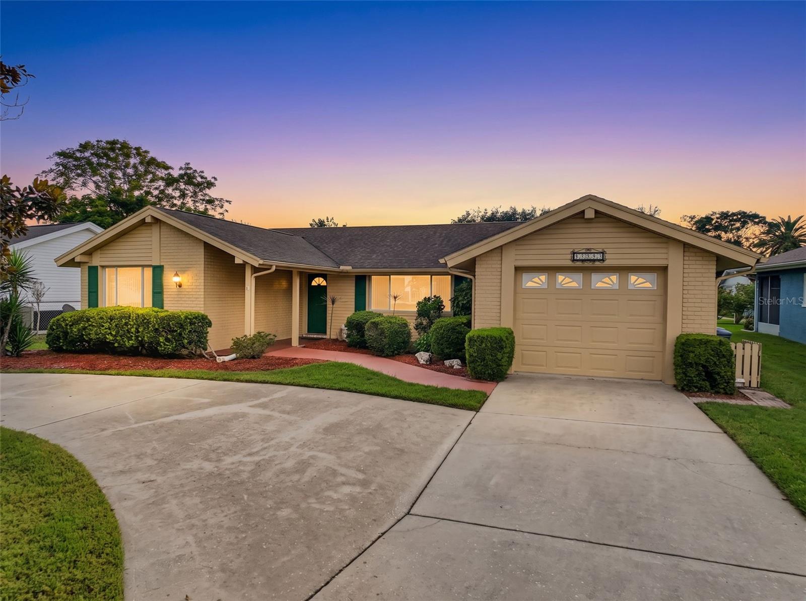 This WELL-MAINTAINED HOME is located in the desired DEED RESTRICTED BEACON WOODS VILLAGE SUBDIVISION featuring 3 BEDROOMS, 2 BATHS, WOOD FLOORS, and a LARGE SCREENED-IN LANAI. UPDATES include a NEW PRIMARY BATHROOM and NEWER ROOF and HOT WATER HEATER. The HOMEOWNERS ASSOCIATION  CLUBHOUSE AMENITIES include HEATED SWIMMING POOL, LOCKER ROOMS & SHOWERS, BASKETBALL, PICKLEBALL, BOCCE BALL, TENNIS, and SHUFFLEBOARD COURTS. Inside the CLUBHOUSE you will find a BILLARD ROOM, CARDIO EXERCISE EQUIPMENT w/UNIVERSAL MACHINE. Other amenities include a PLAYGROUND and PICNIC AREA. There are also many scheduled events daily and weekly such as ARTS & CRAFTS, CARD GROUPS and EXERCISE CLASSES.  You can also rent the CLUBHOUSE for SPECIAL OCCASIONS.  All your local waterfront restaurants like Inn on the Gulf, Sam's Beach Bar and Get Hooked are a 5-minute drive. After dinner you can relax and enjoy a beautiful sunset at HUDSON BEACH. Sun West Park is a local tourist waterfront attraction that is nearby as well. The HCA Florida Bayonet Point Hospital, local supermarkets and the Port Hudson Marina are all found right here in Hudson, Florida. The Tampa Bay Airport, Tampa Bay, Clearwater Beach, Homosassa Springs, Tarpon Springs, Pine Island, Honeymoon Island and Weeki Wachee are all under an hour away. Call for a PRIVATE SHOWING