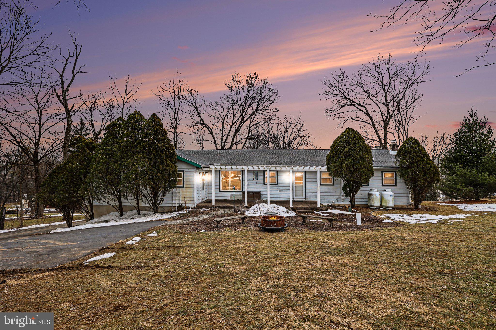 Welcome home to effortless, turn-key living in the heart of Silver Spring Township and Cumberland Valley Schools. Set on a beautifully mature lot spanning over half of an acre, this sprawling 3-bedroom, 2-bath ranch offers the ease of true single-level living with the rare balance of privacy and a connected neighborhood feel. The thoughtfully designed floor plan features generously sized living spaces, including a fully equipped kitchen, formal living room, and a separate family room well-suited for both everyday living and entertaining. The family room is anchored by a floor-to-ceiling brick hearth, custom butternut wood mantel, and wood stove fireplace insert, creating a warm and inviting focal point. Paired with the adjoining dining area, this space offers exceptional flexibility—perfect for quiet evenings at home or hosting gatherings with ease. While the layout and setting are impressive, it’s the attention to detail that truly sets this home apart! Major improvements have already been completed, including a recently installed roof and skylights, propane furnace, hot water heater, water softening system, and an updated driveway and paver walkway, providing confidence and peace of mind for years to come. Dutifully updated, meticulously maintained, and truly move-in ready—this Mechanicsburg rancher is one you will not want to miss.
