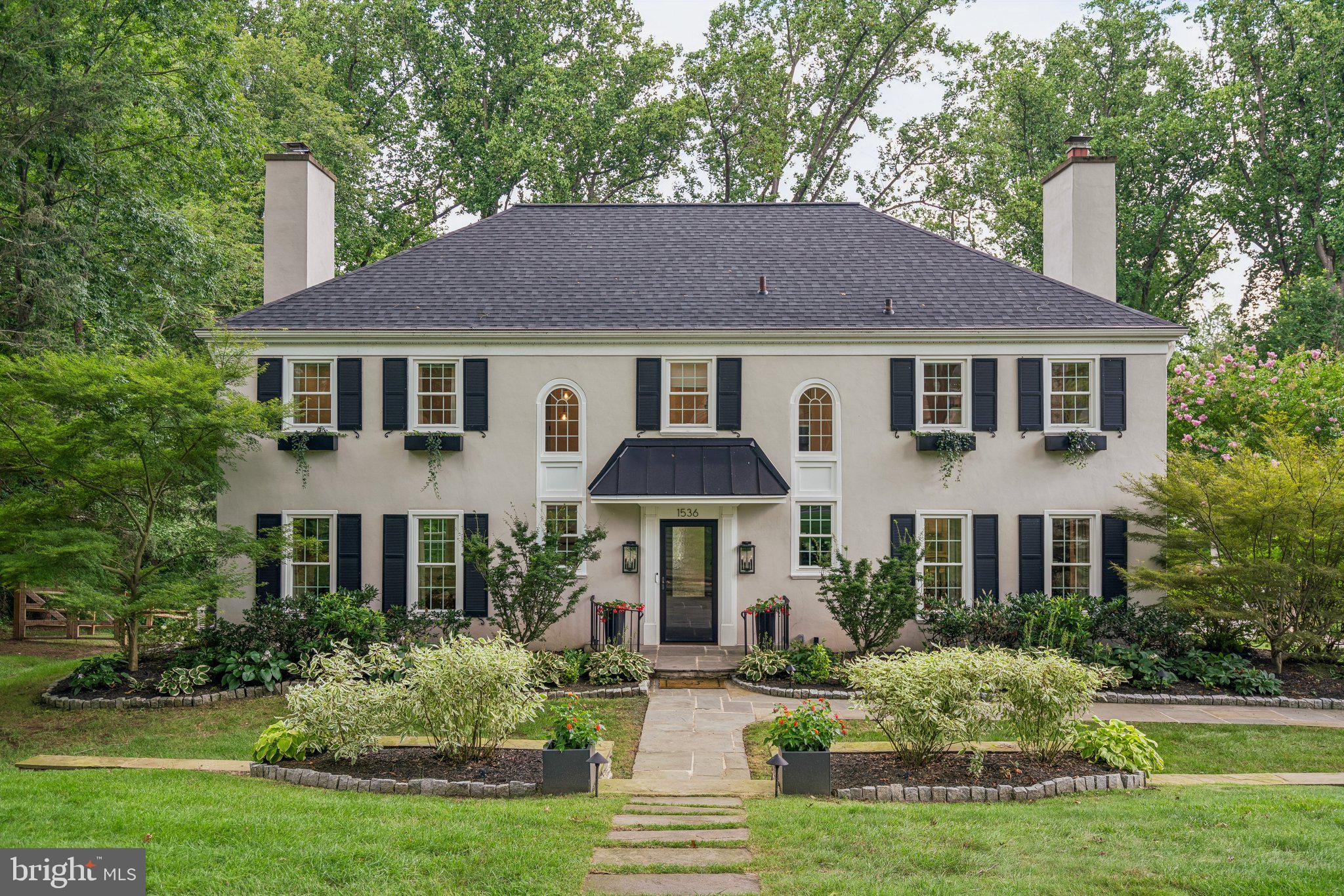 Located in the heart of Gladwyne, this thoughtfully and meticulously updated home combines timeless design with modern comfort in one of the Main Line's most sought-after neighborhoods. Offering five bedrooms, four full bathrooms, and one half bath, the home provides generous living spaces with a layout that is both functional and welcoming.Recent major improvements include: new roof (2024), new HVAC (2024), new plumbing (2024), Lutron smart electrical (2024), new 75g HWH (2025), new whole home generac generator (2025), and new windows throughout (2026).A gracious foyer with black-and-white checkered marble flooring sets the tone for the home's classic meets modern interior. Hardwood floors extend throughout the main living areas, beginning with the formal living room, where a working wood-burning fireplace creates a warm and inviting gathering space. The formal dining room, highlighted by a large bay window, is filled with natural light and offers ample space for hosting family dinners or larger celebrations.The bright and inviting kitchen offers abundant workspace with granite countertops, custom cabinetry, stainless steel appliances, a double oven, and a large center island. Open to the family room, it creates a functional layout that makes everyday living and entertaining effortless. The adjoining family room is anchored by a second working wood-burning fireplace, offering a comfortable space to gather with family and friends, or for children to play or do homework as meals are prepared.The second level offers five generously sized bedrooms, including two with ensuite bathrooms for added privacy. The primary suite serves as a peaceful retreat with raised ceilings, spacious his-and-her closets, and a beautifully appointed ensuite bath. The oversized walk-in shower features dual diverter shower heads, creating a spa-like experience while maintaining the home's understated elegance.The finished walkout lower level provides exceptional flexibility and functions beautifully as an in-law or guest suite. Complete with a private full bathroom, pantry storage, and direct access to the rear patio, it offers a comfortable, self-contained space for extended family, overnight guests, or multi-generational living. It also provides plenty of additional room for recreation, a home office, fitness space, or media room.Outdoor living is equally inviting, with a bi-level deck and rear patio offering plenty of space for dining, entertaining, or simply enjoying the peaceful setting. A rear-entry two-car garage preserves the home's curb appeal while adding everyday convenience.Located within the highly regarded Lower Merion School District and just minutes from the shops, restaurants, and amenities of the Main Line, this home offers an ideal combination of location, space, and thoughtful updates. Blending classic character with carefully considered improvements, this is a home designed for comfortable everyday living and effortless entertaining.
