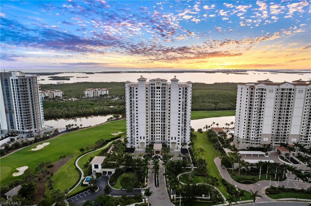 Experience unparalleled luxury in this meticulously designed 3-bedroom, 3.5-bathroom high-rise condominium located in the prestigious Altaira at The Colony at Pelican Landing. Unit #303 offers 3,315 sq ft of sophisticated living space, featuring panoramic views of Estero Bay, the Gulf of Mexico, and The Colony Golf & Country Club.
Enter through a secure, private elevator lobby that opens directly into the residence, ensuring both privacy and convenience. The chef-inspired kitchen is equipped with top-of-the-line Thermadore appliances, custom cabinetry, and a spacious quartz island, ideal for culinary enthusiasts. The expansive great room boasts floor-to-ceiling windows, allowing natural light to flood the space and offering unobstructed water views.
Throughout the home, you'll find high-end finishes including porcelain tile flooring, designer lighting, and custom built-ins that enhance the home's aesthetic appeal.The oversized primary suite features a spa-like bathroom with a soaking tub and glass-enclosed walk-in shower, providing a serene escape. Enjoy the outdoors from two private terraces, each offering stunning views and ample space for relaxation or entertaining.
Altaira at The Colony Residents have access to a range of luxury amenities, including a 24-hour concierge service, infinity-edge pool with cabanas, state-of-the-art fitness center, rooftop observatory, 3 guests suites, and a 3,000 sq ft social room. This exclusive community offers a private 34-acre island beach park with boat shuttle service, pickleball and tennis courts, sailing, bocce, and a variety of social activities. Two enclosed garage spaces for secure parking. Impact-resistant windows and doors for added safety and peace of mind.Conveniently located near world-class shopping, dining, entertainment, and Southwest Florida International Airport. Unit #303 at Altaira offers a rare opportunity to own a piece of paradise in one of Southwest Florida's most sought-after communities. With its exceptional design, breathtaking views, and unparalleled amenities, this residence is truly must-see.
For more information or to schedule a private showing, please contact Mike Monge 239-560-5523 or Bruce Larson at 865-310-7333.