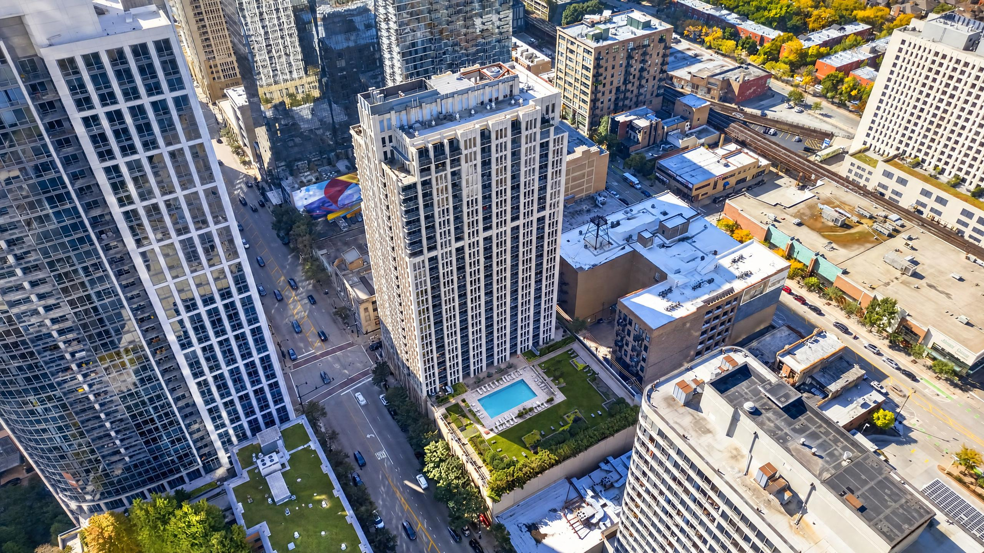Beautifully updated high-floor residence in the heart of the South Loop with sweeping city, lake and Grant Park views. This stylish one-bedroom plus den offers a bright, open layout framed by expansive windows, new flooring and a private balcony - the perfect spot to take in the skyline. The thoughtfully updated kitchen features warm wood cabinetry, stone countertops, stainless steel appliances, subway tile backsplash and a peninsula with seating that opens to the living and dining areas. The spacious primary bedroom features custom built-ins, while the beautifully renovated bathroom offers a fresh, modern feel. A thoughtfully built-out den provides a dedicated home office with custom cabinetry, shelving and workspace. Custom closet systems throughout maximize storage and organization, adding exceptional functionality to this beautifully appointed home. In-unit laundry completes the package. Michigan Avenue Tower offers full-service living with 24-hour door staff, on-site management, fitness center, outdoor pool, landscaped sundeck and green space, party room, receiving room and additional storage. All of this in an exceptional South Loop location just moments from Grant Park, the lakefront, Museum Campus, restaurants, shopping, public transportation and everyday conveniences. Premium heated garage parking available for an additional $30,000.
