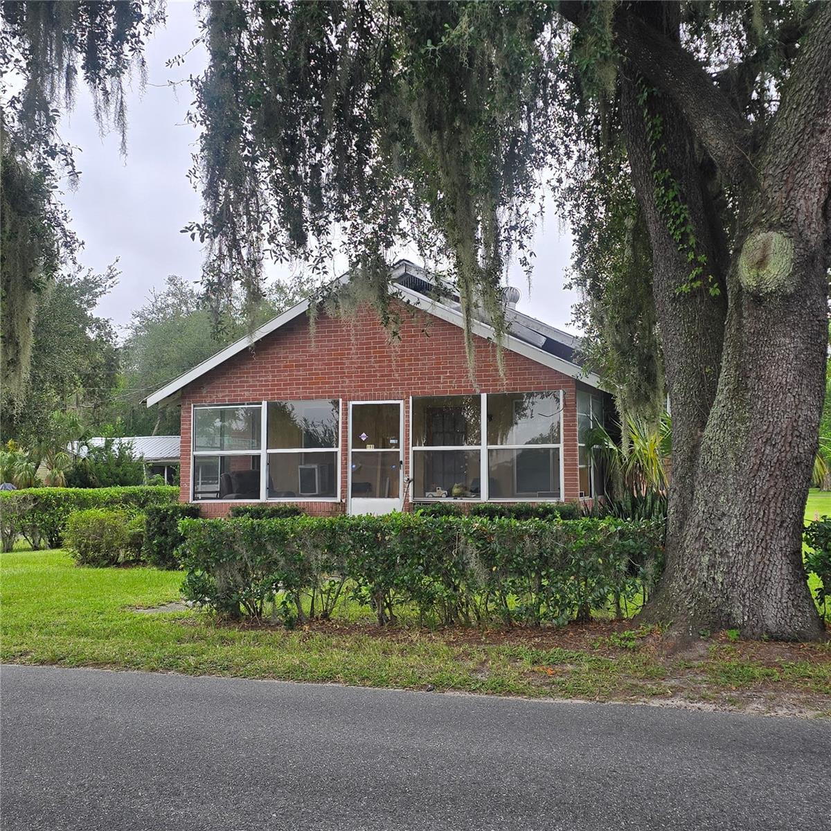 Investment Opportunity Near the Strawberry Festival! This charming 3-bedroom 2-bathroom brick home, built in 1940, offers an excellent opportunity for investors looking to add a cash-flowing property to their portfolio. The home features a durable metal roof and window-unit cooling and is currently tenant occupied, providing an established rental opportunity from day one. One of the standout features is the road-to-road lot, offering access and flexibility from both the front and rear. The rear portion of the property could provide valuable additional space for parking, storage, or other potential uses, subject to applicable zoning and approvals. Located just minutes from the Florida Strawberry Festival, the property's location may also create an opportunity for seasonal event parking or other income-producing possibilities during festival time. Whether you're looking to expand your rental portfolio or capitalize on the property's unique location and lot configuration, this one is worth a look! Bring your investment ideas and see the possibilities.