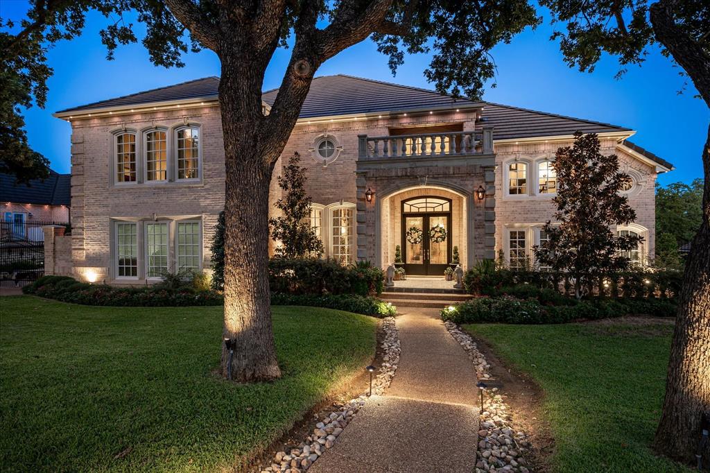 Nestled on nearly half an acre in the prestigious Cranbrook Estates community, this beautifully updated 6,590 sq. ft. estate blends timeless architecture with modern comfort. Recent improvements include new windows, HVAC systems, flooring, and interior paint, providing move-in-ready luxury in one of Colleyville's most sought-after neighborhoods.A grand European-inspired façade, lush landscaping, mature shade trees, and extensive landscape lighting create exceptional curb appeal. Inside, soaring ceilings, rich hardwood floors, elegant millwork, and dramatic floor-to-ceiling windows fill the home with natural light while offering views of the backyard retreat.The thoughtfully designed floor plan features 4 spacious bedrooms, including two on the main level. The oversized primary suite is a private sanctuary with a luxurious ensuite bath, while a separate guest suite with ensuite bath and private exterior access is ideal for multigenerational living, long-term guests, or a private home office setup.Upstairs, you'll find two additional bedrooms, including one with a balcony overlooking the backyard, along with a dedicated theater room and an expansive game room. The game room includes a pool table and full-size shuffleboard table, both conveying with the home.Designed for entertaining, the resort-style backyard offers an in-ground pool, multiple outdoor living spaces, an outdoor fireplace, and a fully equipped outdoor kitchen with built-in grill and refrigerator. Beautifully refreshed landscaping enhances the private setting and creates an ideal backdrop for year-round enjoyment.Combining exceptional updates, versatile living spaces, and outstanding indoor-outdoor amenities, this Cranbrook Estates residence offers luxury living at its finest. Care has been taken to provide accurate info but buyers and buyers agent please verify all measurements, taxes and schools.