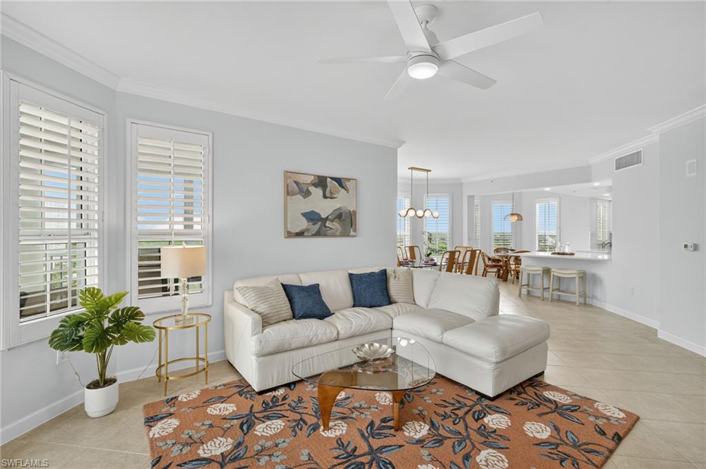 MOTIVATED SELLER! MUST SELL ASAP! This beautifully remodeled #07 END UNIT is the largest floor plans in the building with 3BR / 3BA, more than double the number of windows, and an oversized wrap-around lanai. Positioned perfectly with wide views of Turkey Bay and the Gulf. This home has undergone some beautiful upgrades including a remodeled kitchen, with quartz countertops and new appliances, kitchen wall removed to make a nice open floor plan, updated light fixtures, with plantation shutters and crown moulding throughout. Secured with electric hurricane shutters on lanai for added protection. Being sold FURNISHED. Just steps away from your building is the award-winning Club at the Dunes which offers a beautiful 25,000 sq. ft. clubhouse, resort style pool, casual indoor and outdoor dining opportunities at the Royal Palm restaurant, the Sandbar, or poolside at the Tiki Bar. The Club makes it easy to stay fit with the state-of-the-art fitness center, group exercise classes, on-site trainers, massage therapists, and the very active tennis and pickleball programs (courts just redone). To top it off, you can't beat this prime location. WALKING DISTANCE to Vanderbilt Beach & nationally acclaimed Delnor Wiggins State Park. And conveniently located near Naples hotspots such as Mercato, Waterside, and Olde Naples. Come and see for yourself!